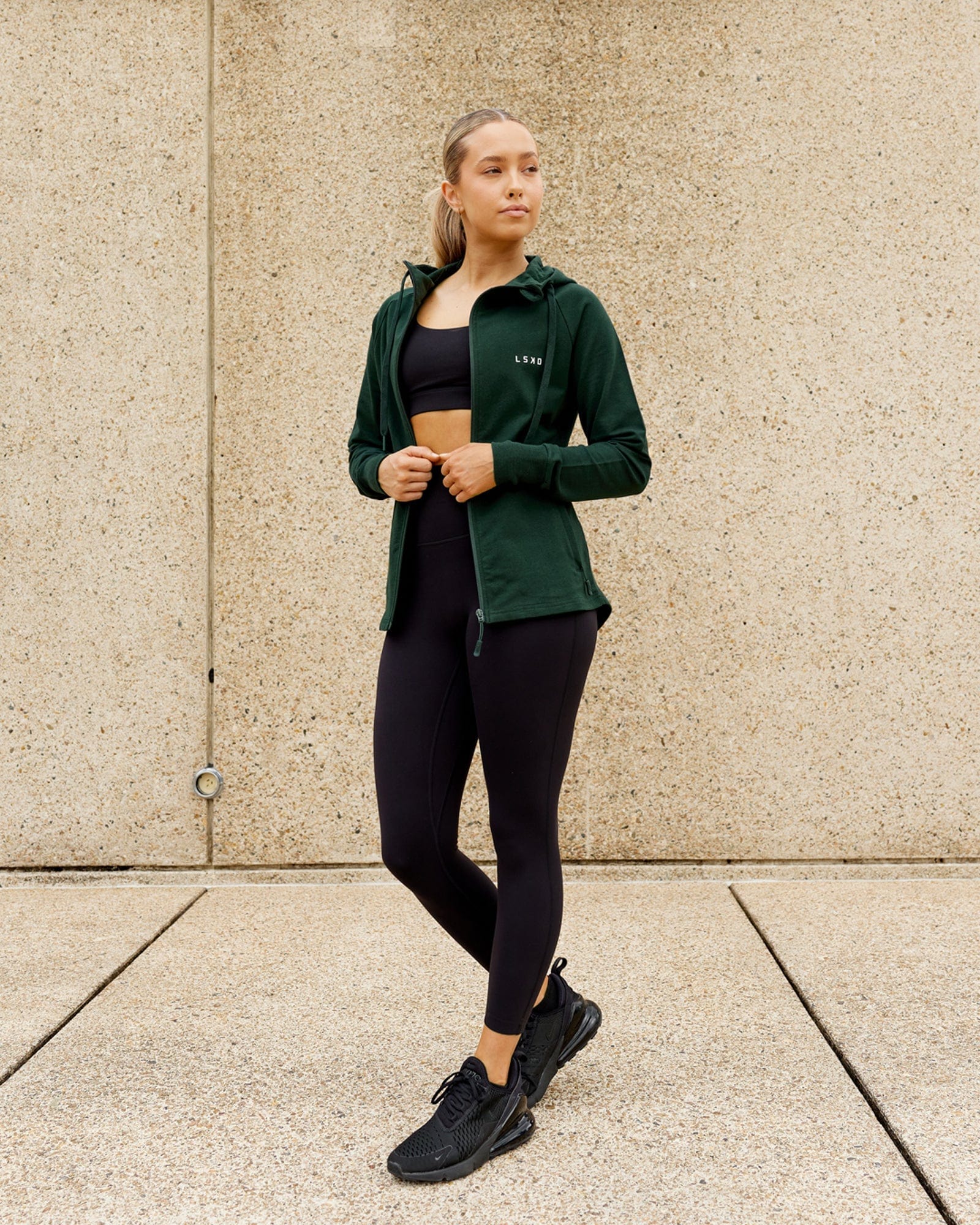 Model wearing PB Zip Through Hoodie - Forest-Tonal