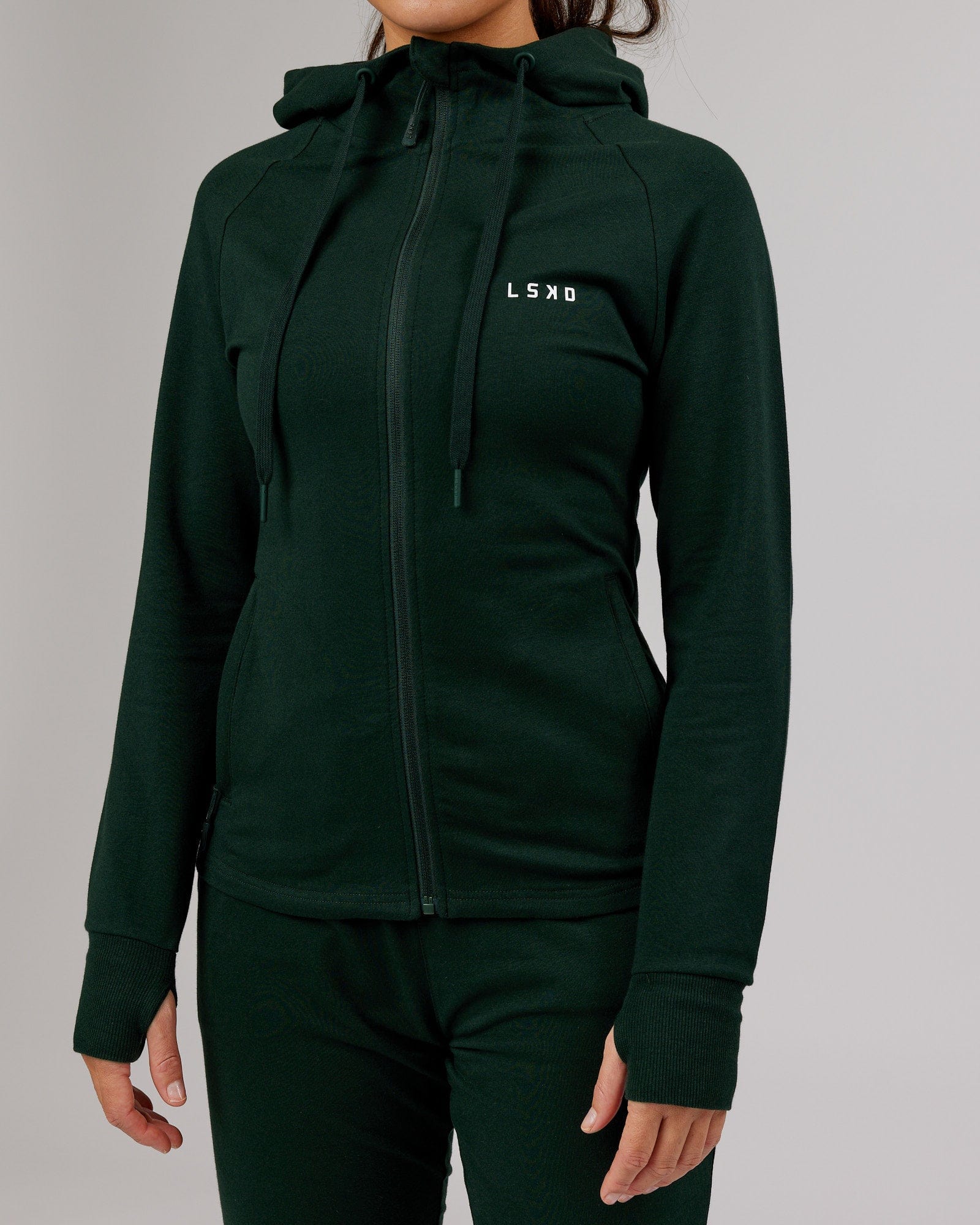 Model wearing PB Zip Through Hoodie - Forest-Tonal