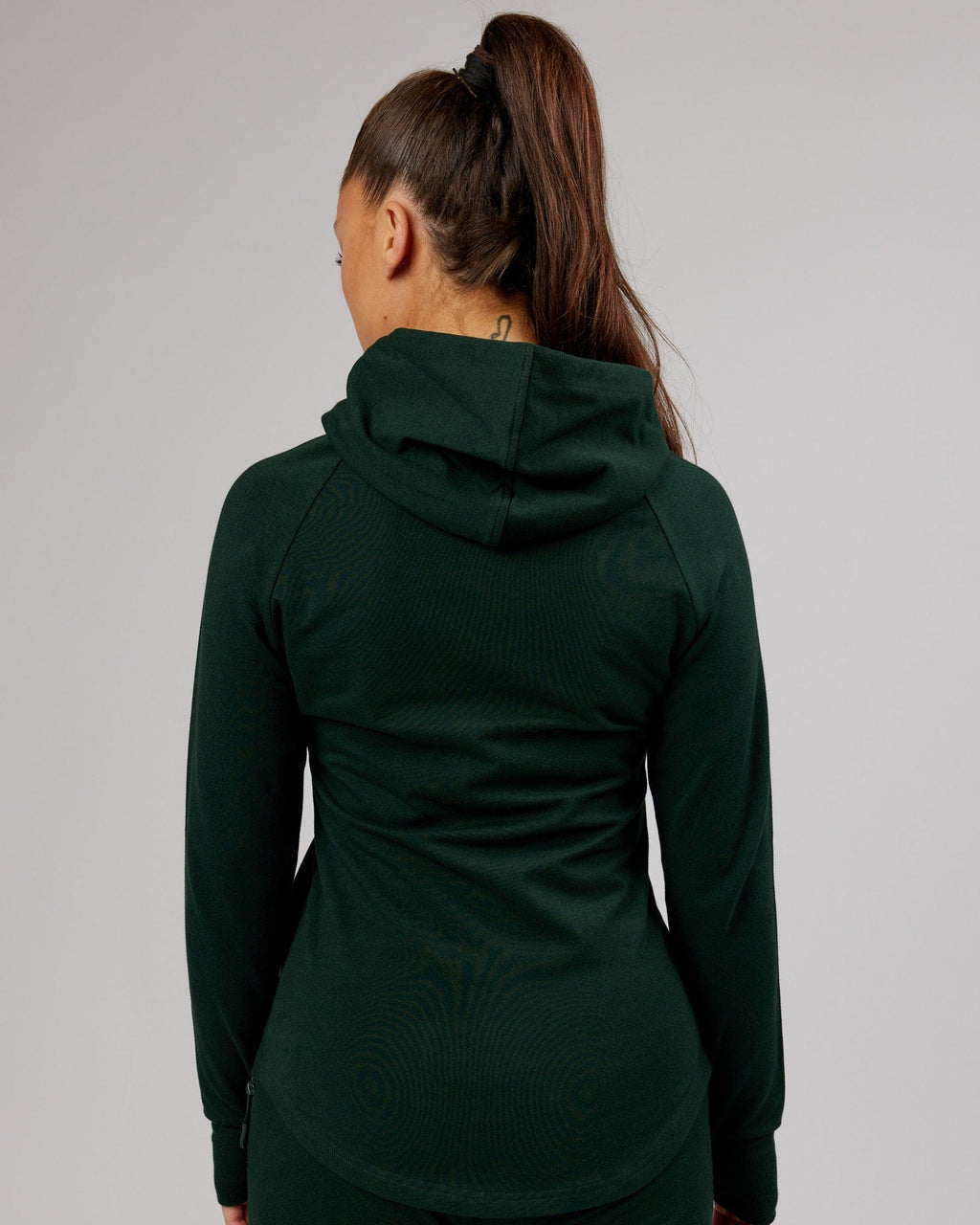 Model wearing PB Zip Through Hoodie - Forest-Tonal