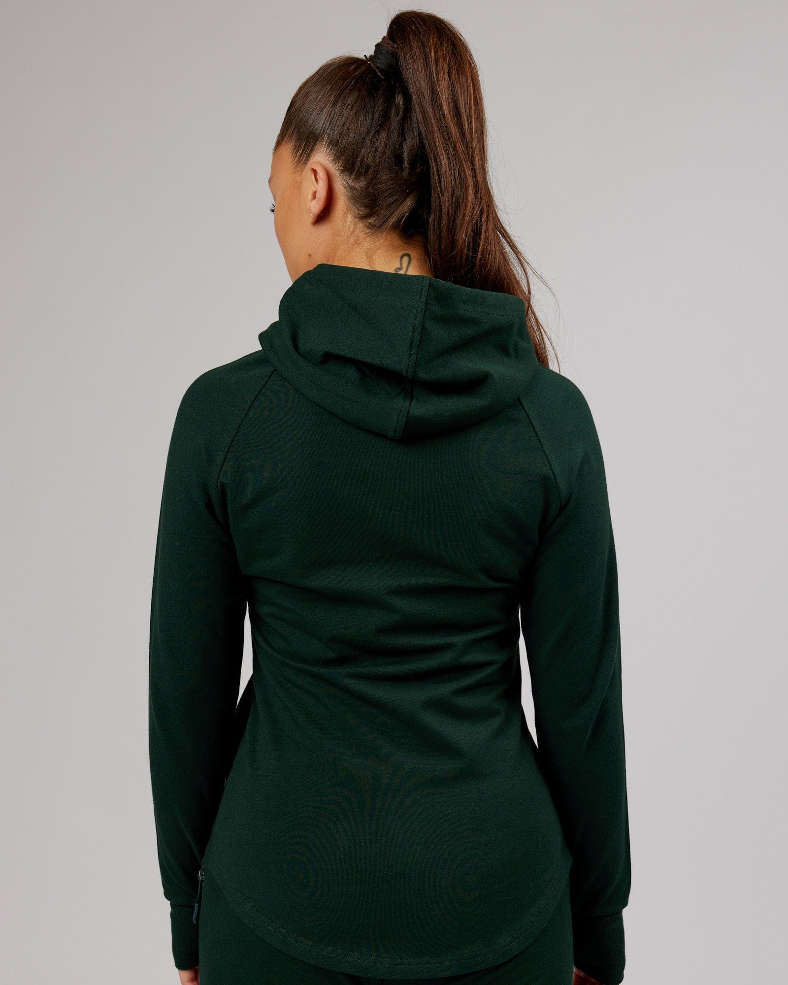 Model wearing PB Zip Through Hoodie - Forest-Tonal