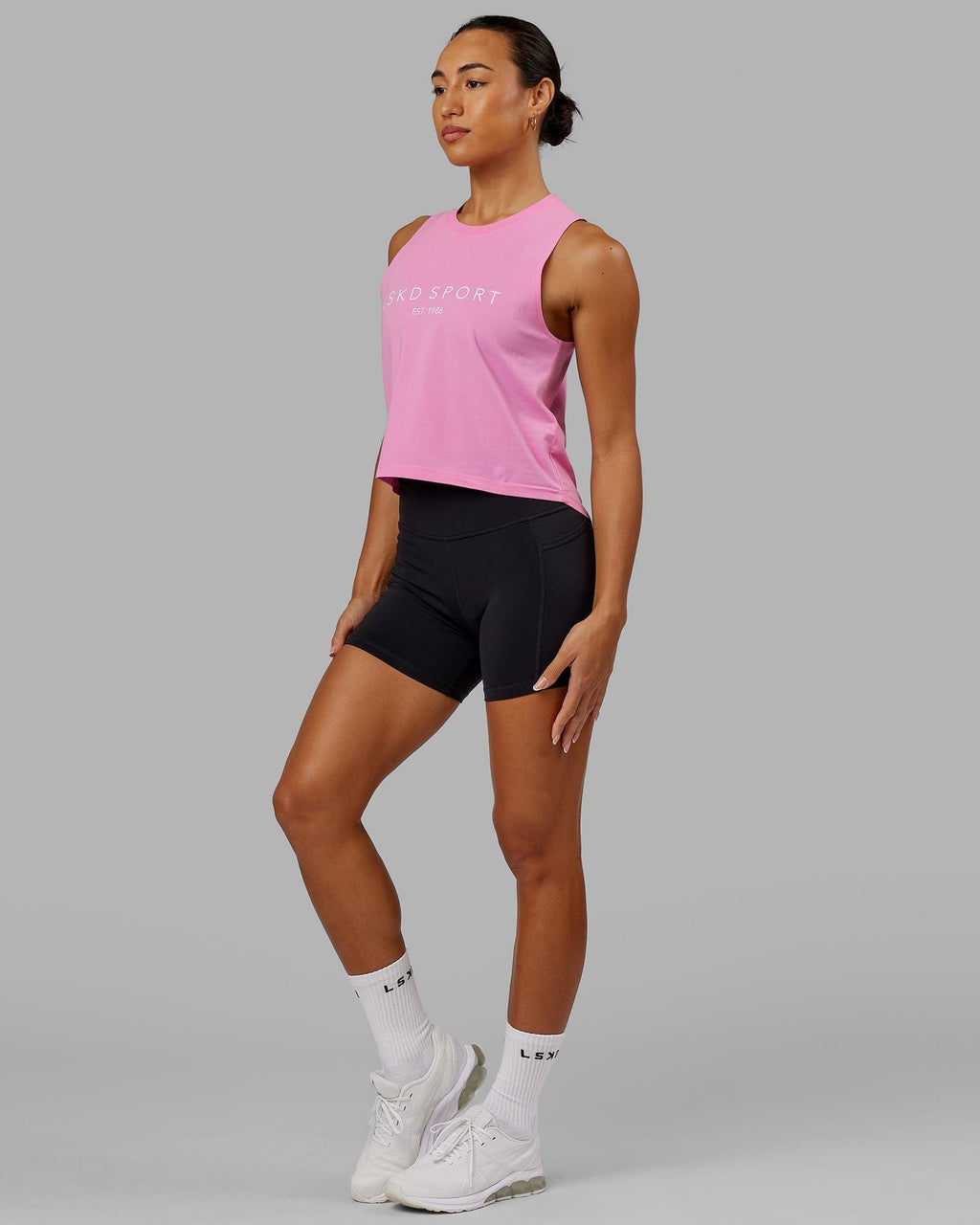 Model wearing Penalty Tank - Pink-Spark