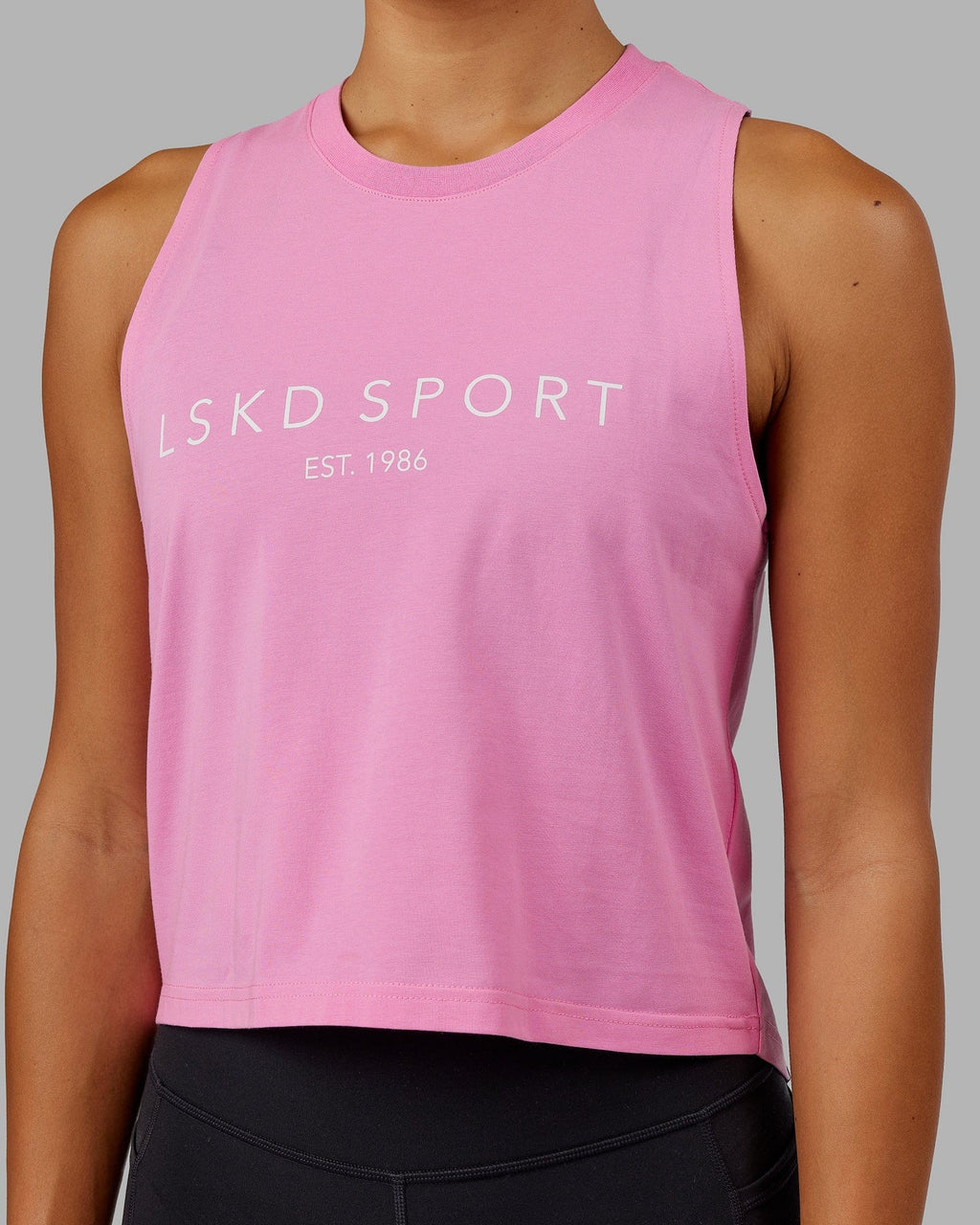 Model wearing Penalty Tank - Pink-Spark