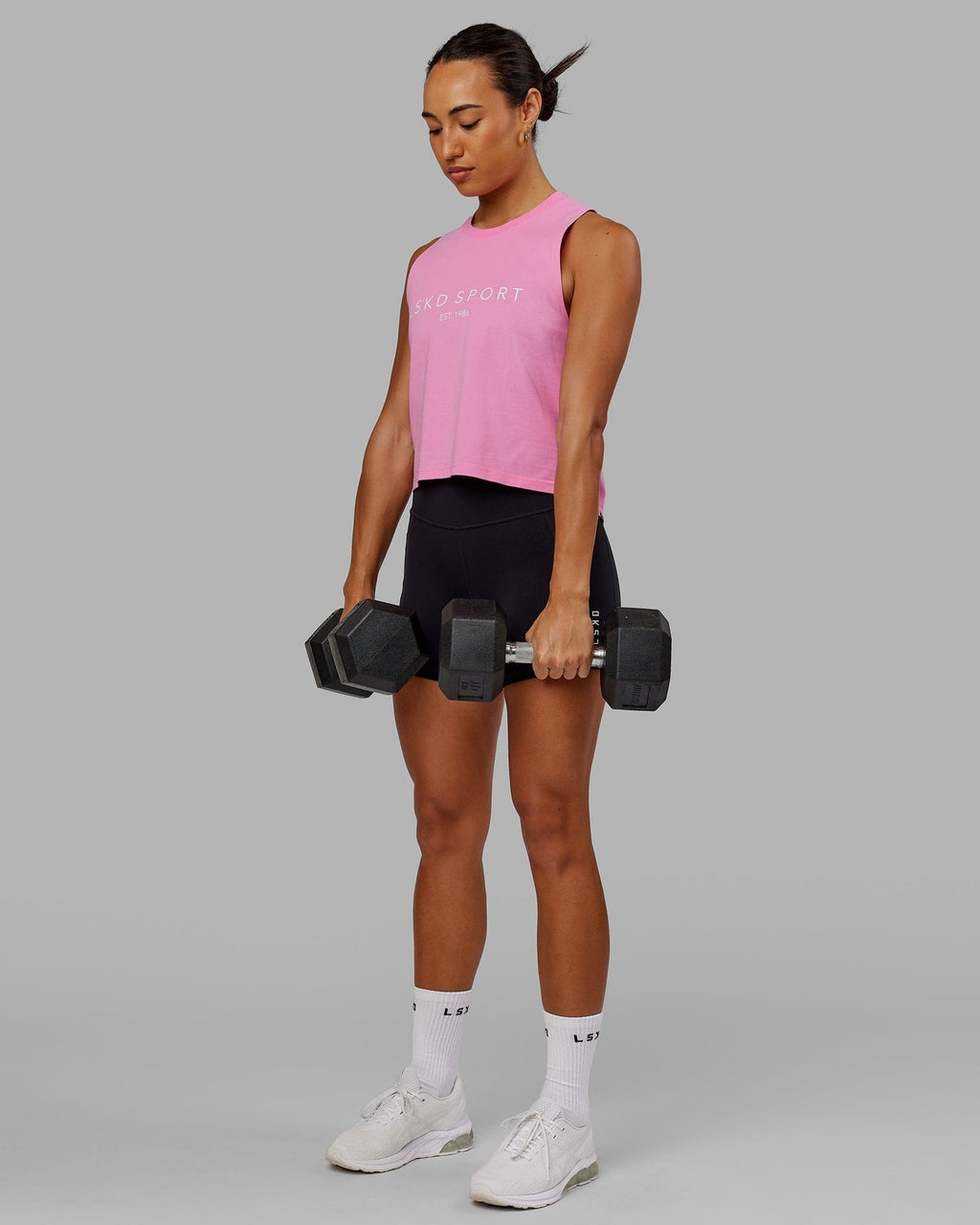 Model wearing Penalty Tank - Pink-Spark