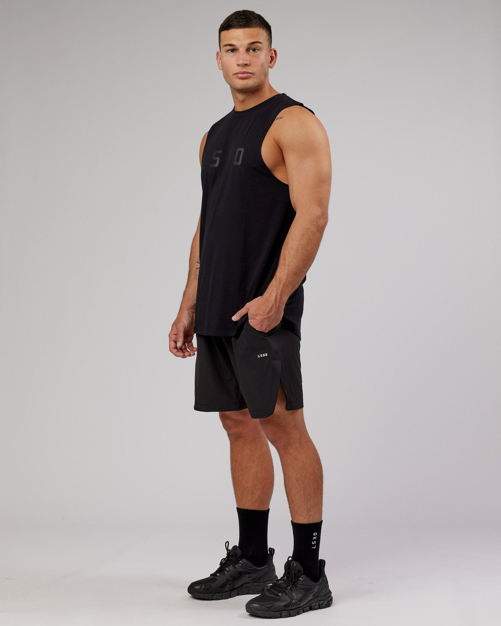 Model wearing Power FLXDRY Training Fit Performance Tank - Black-Black
