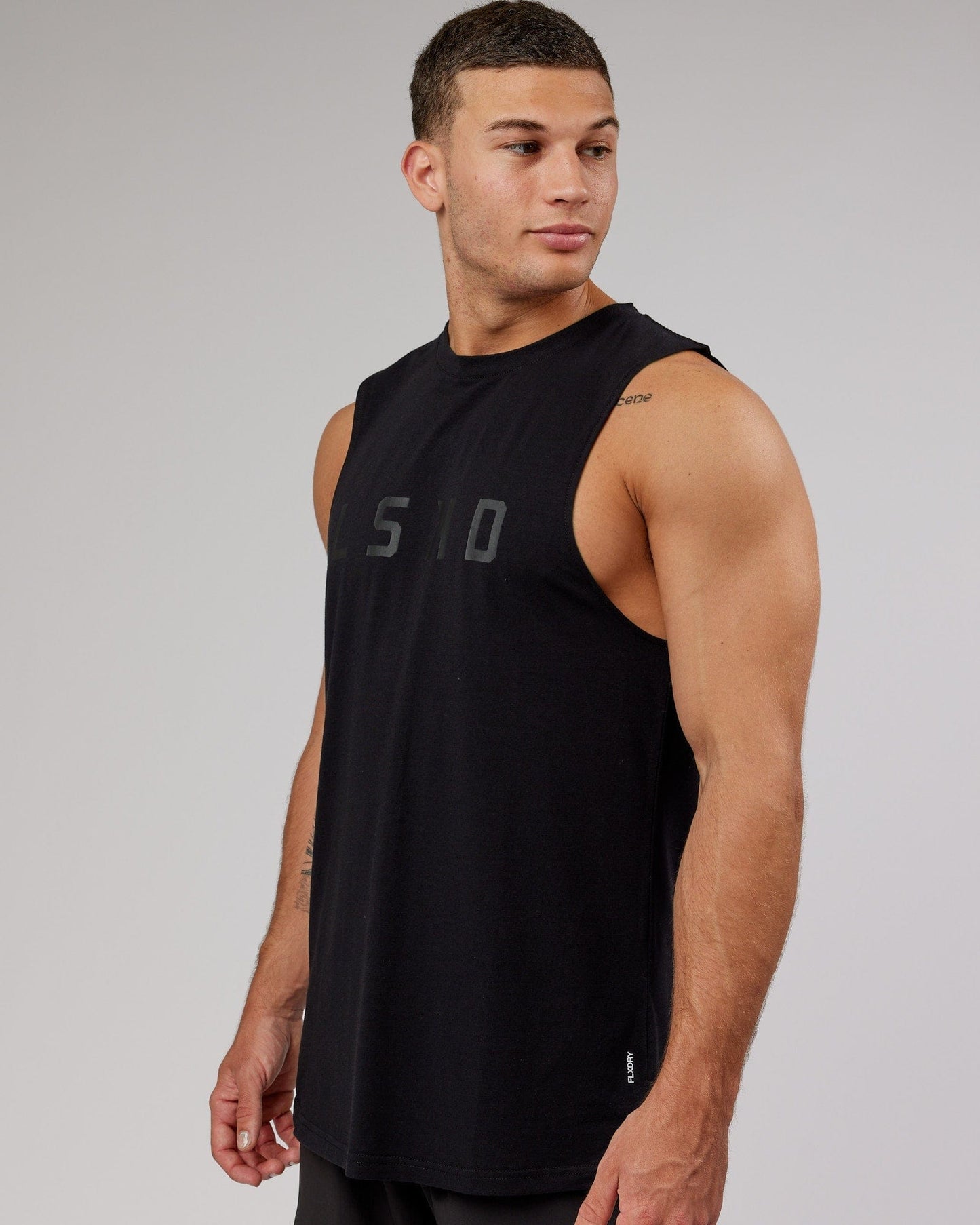 Model wearing Power FLXDRY Training Fit Performance Tank - Black-Black