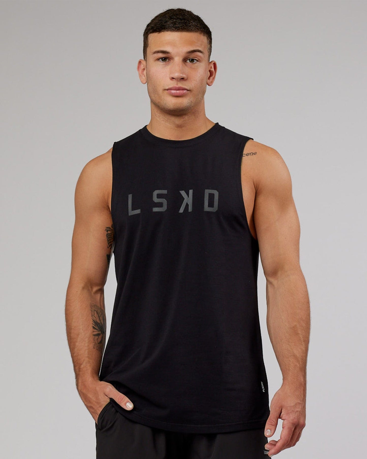 Model wearing Power FLXDRY Training Fit Performance Tank - Black-Black