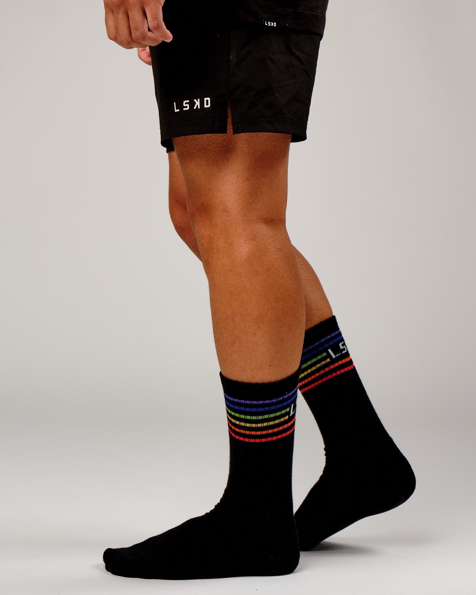 Model wearing Pride Crew Sock - Pride-Black