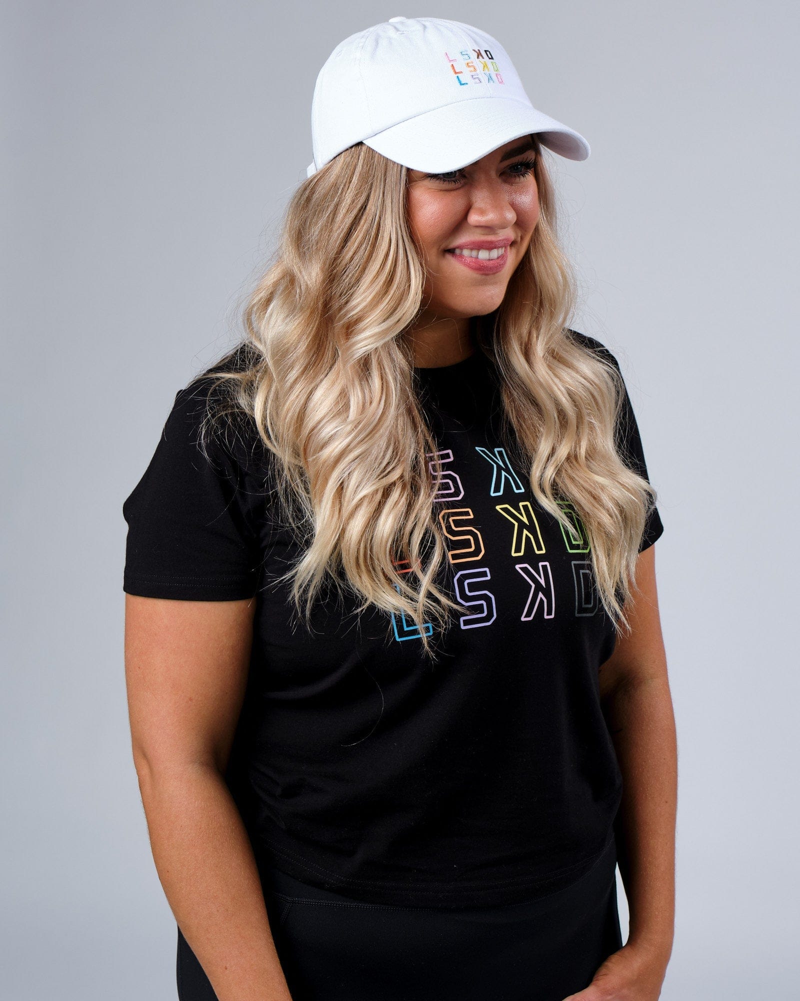 Model wearing Progress Cap - White