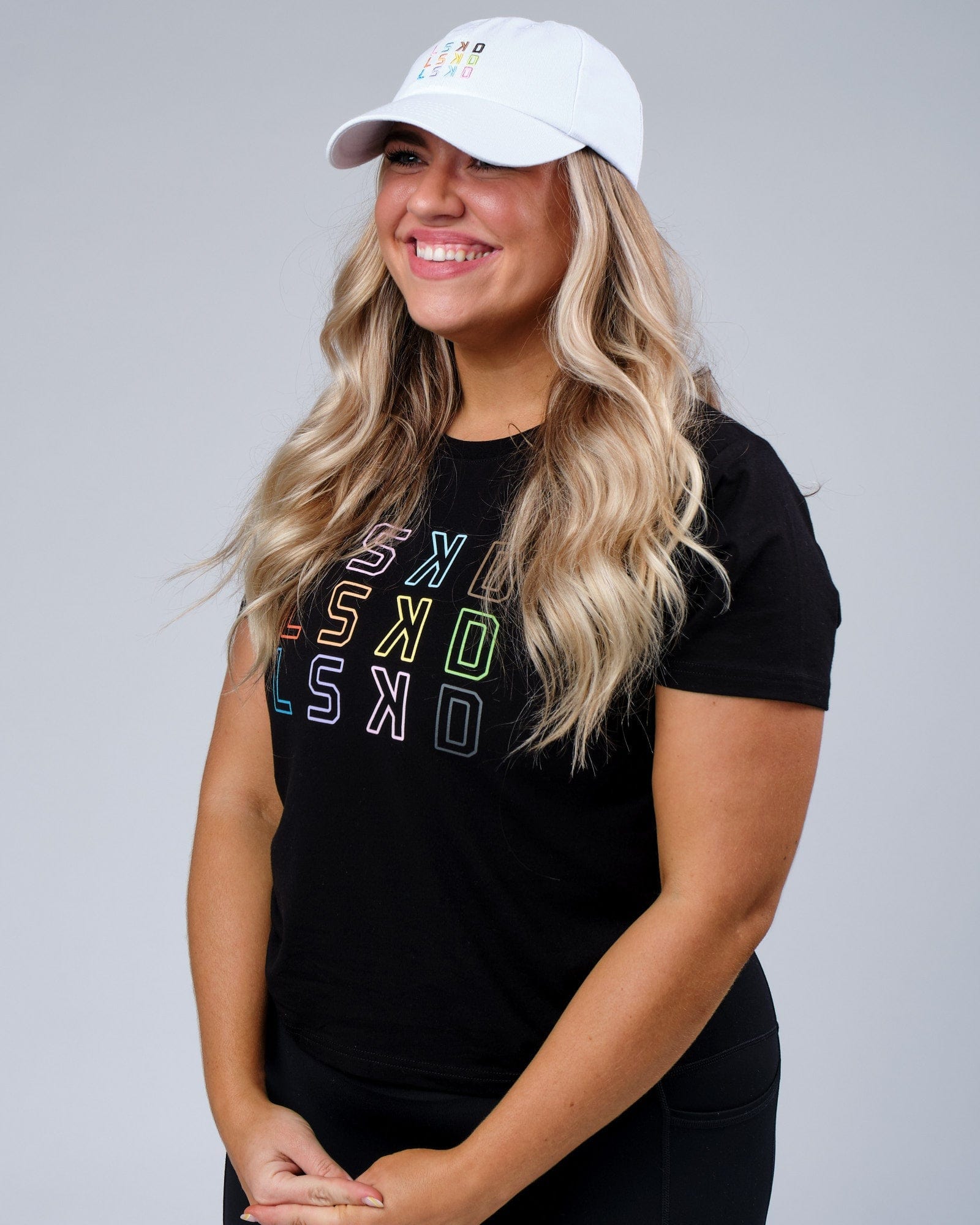 Model wearing Progress Cap - White