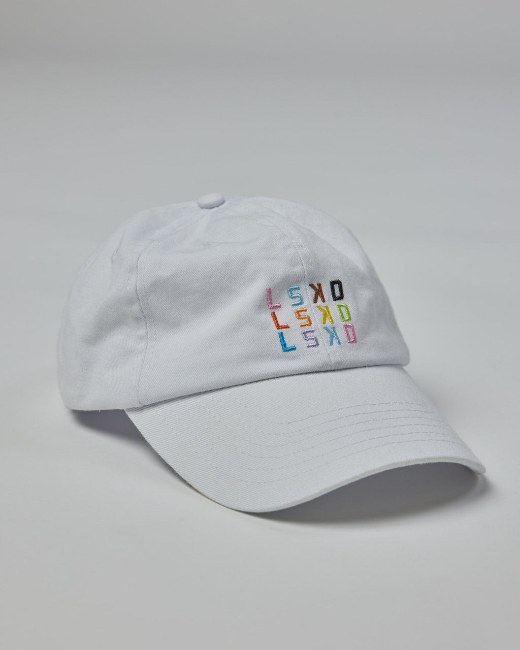 Model wearing Progress Cap - White