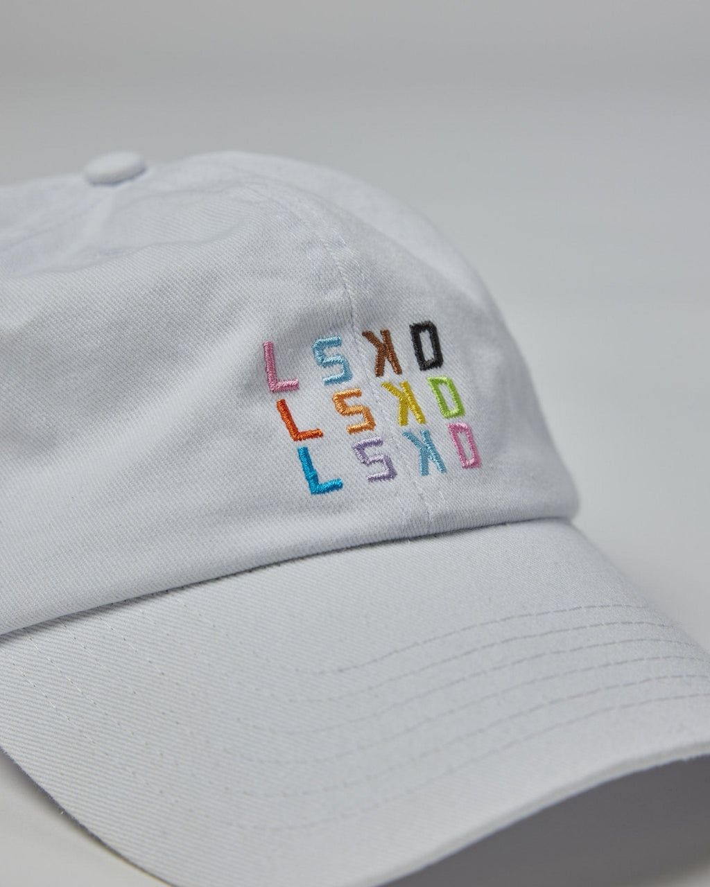 Model wearing Progress Cap - White