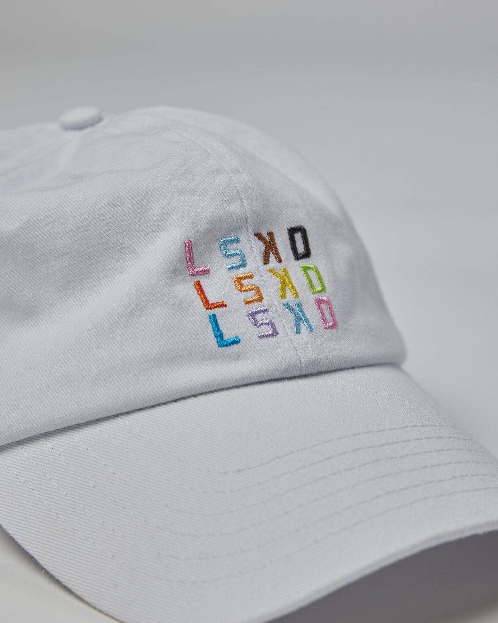 Model wearing Progress Cap - White