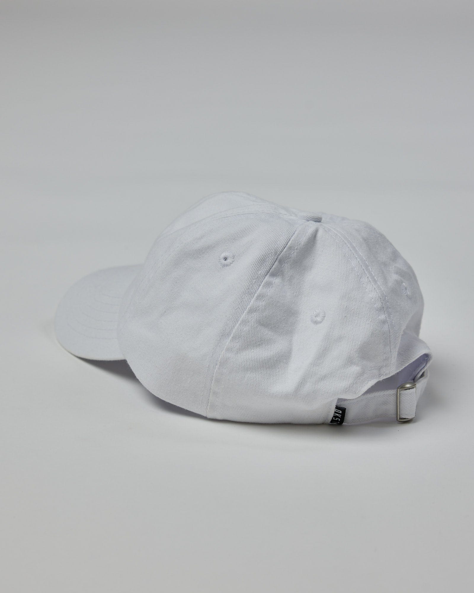 Model wearing Progress Cap - White