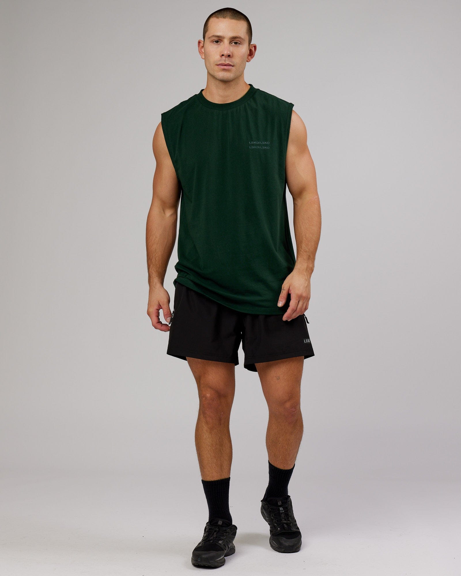 Model wearing Quad FLXCotton Box Tank - Forest