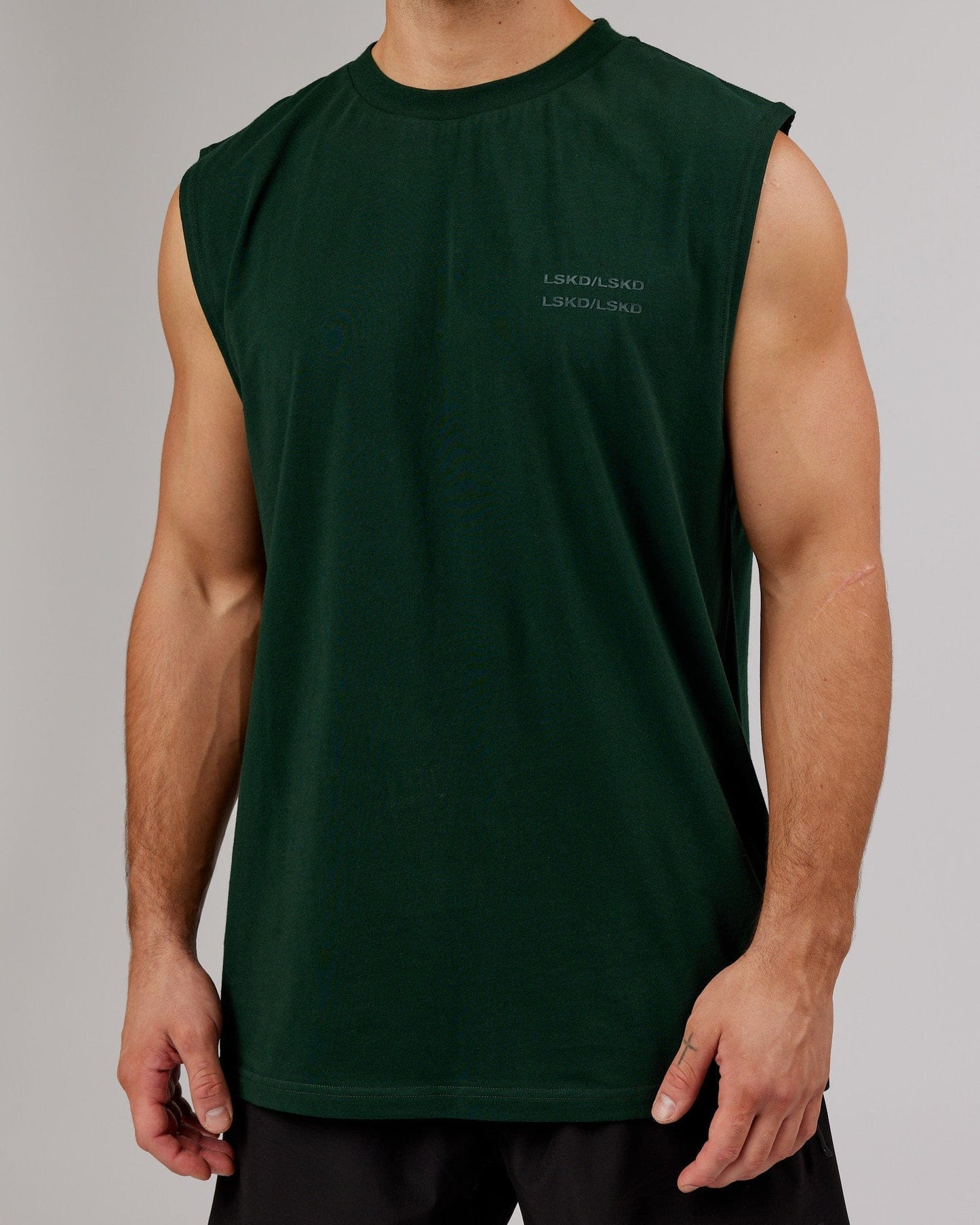Model wearing Quad FLXCotton Box Tank - Forest