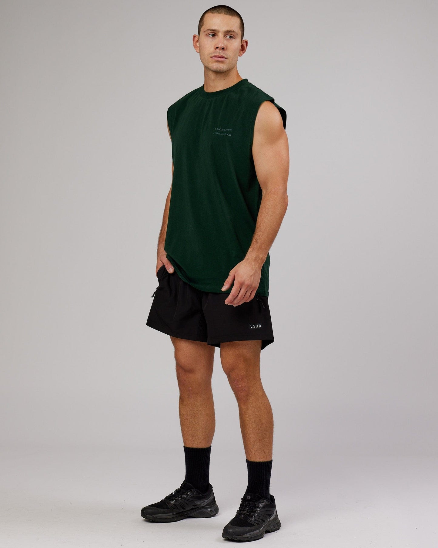 Model wearing Quad FLXCotton Box Tank - Forest