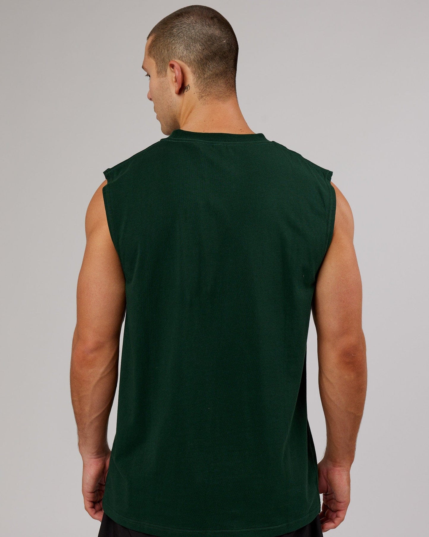 Model wearing Quad FLXCotton Box Tank - Forest