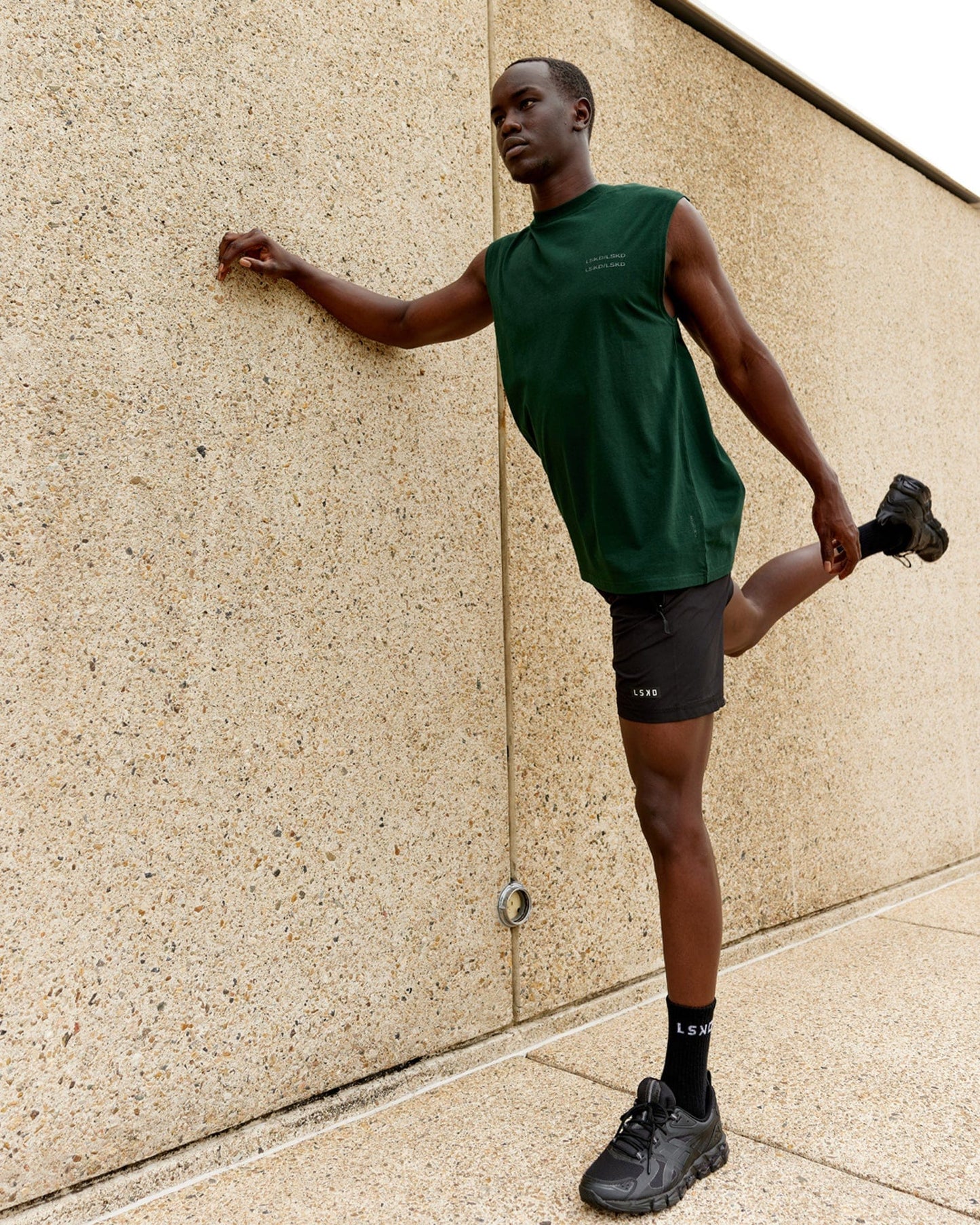 Model wearing Quad FLXCotton Box Tank - Forest