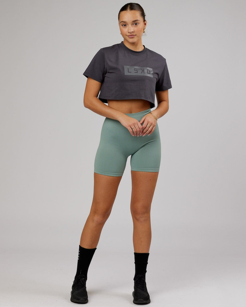 Model wearing Rapid FLXDRY Cropped Tee - Asphalt