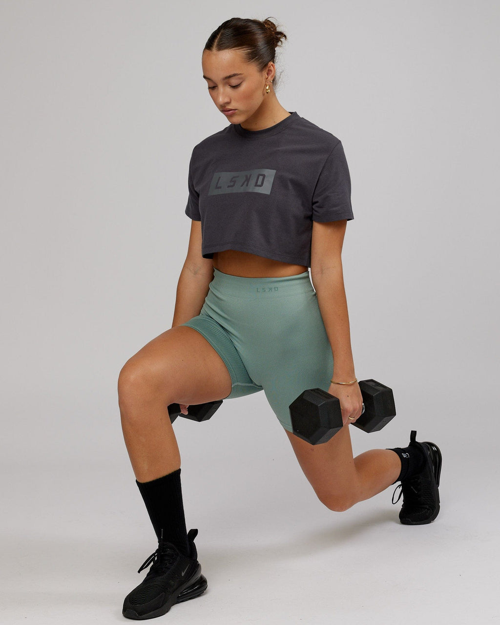 Model wearing Rapid FLXDRY Cropped Tee - Asphalt