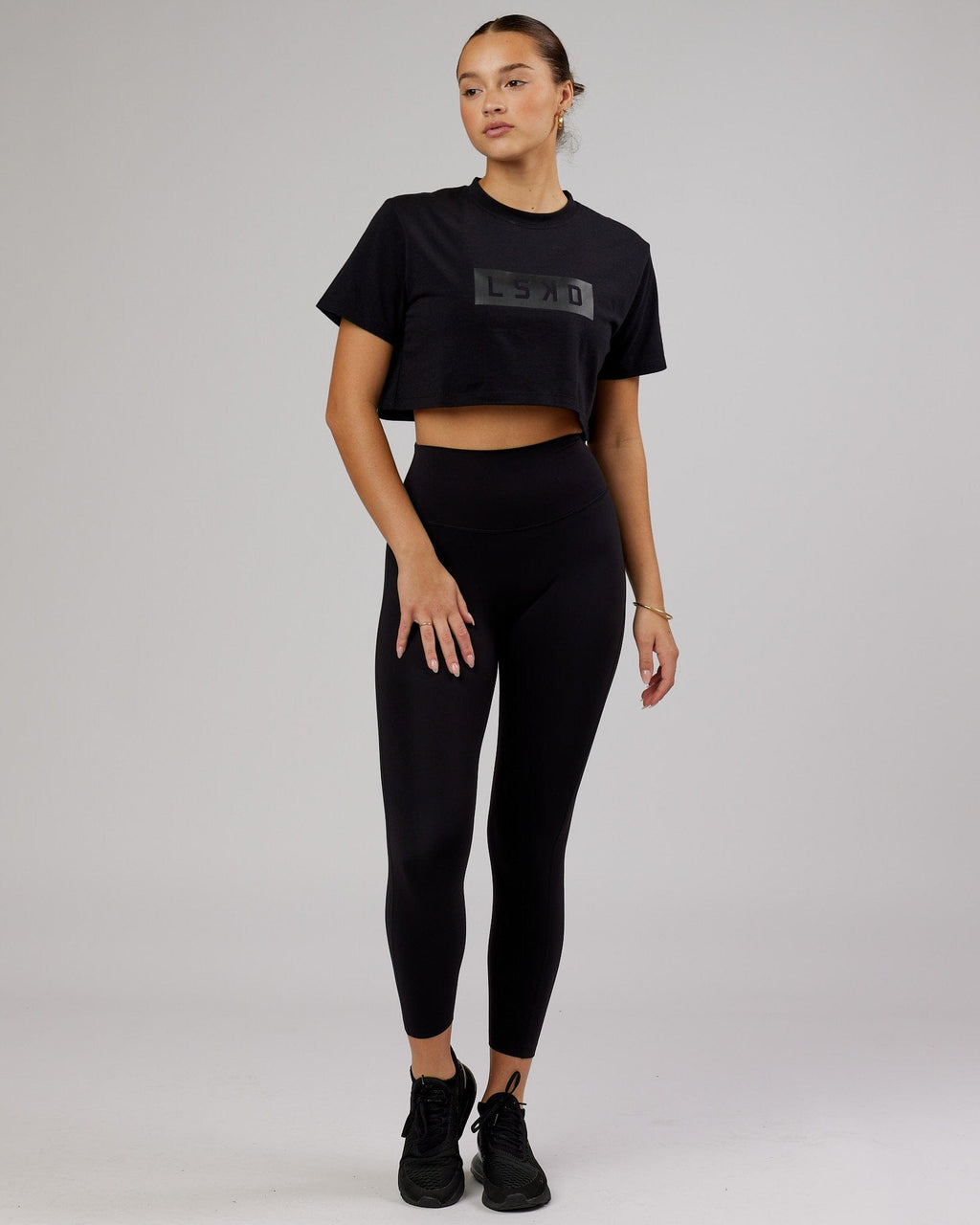 Model wearing Rapid FLXDRY Cropped Tee - Black