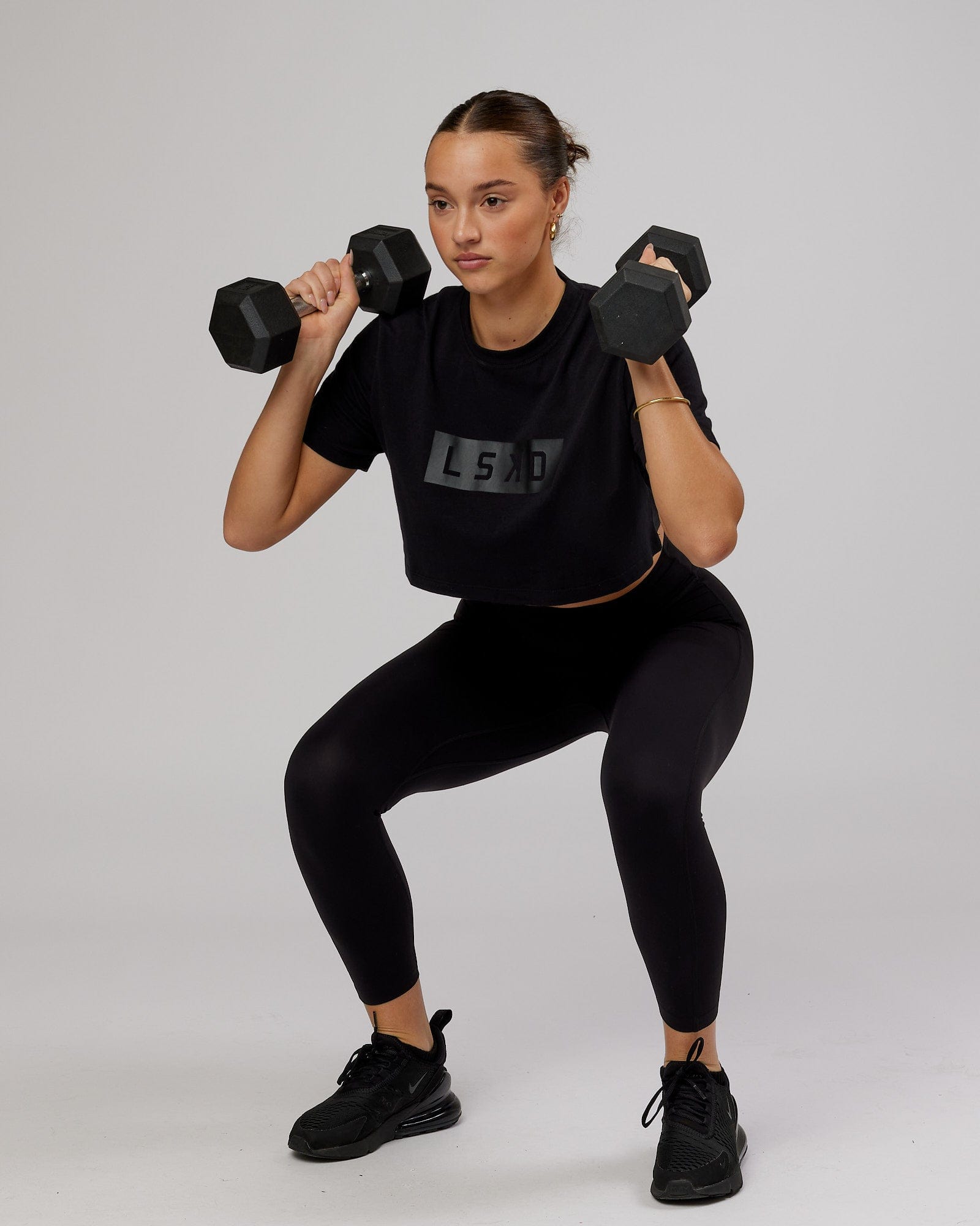 Model wearing Rapid FLXDRY Cropped Tee - Black