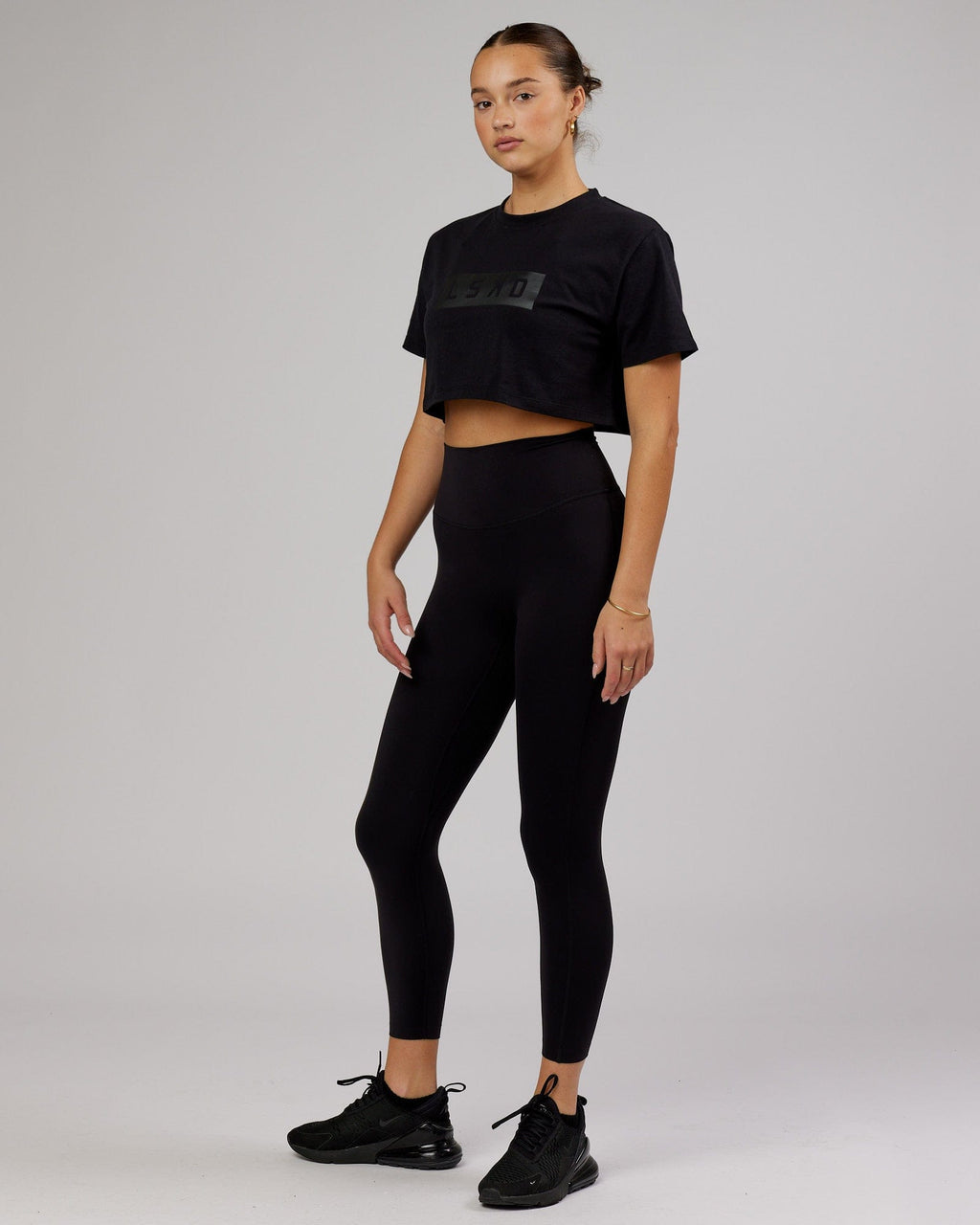Model wearing Rapid FLXDRY Cropped Tee - Black
