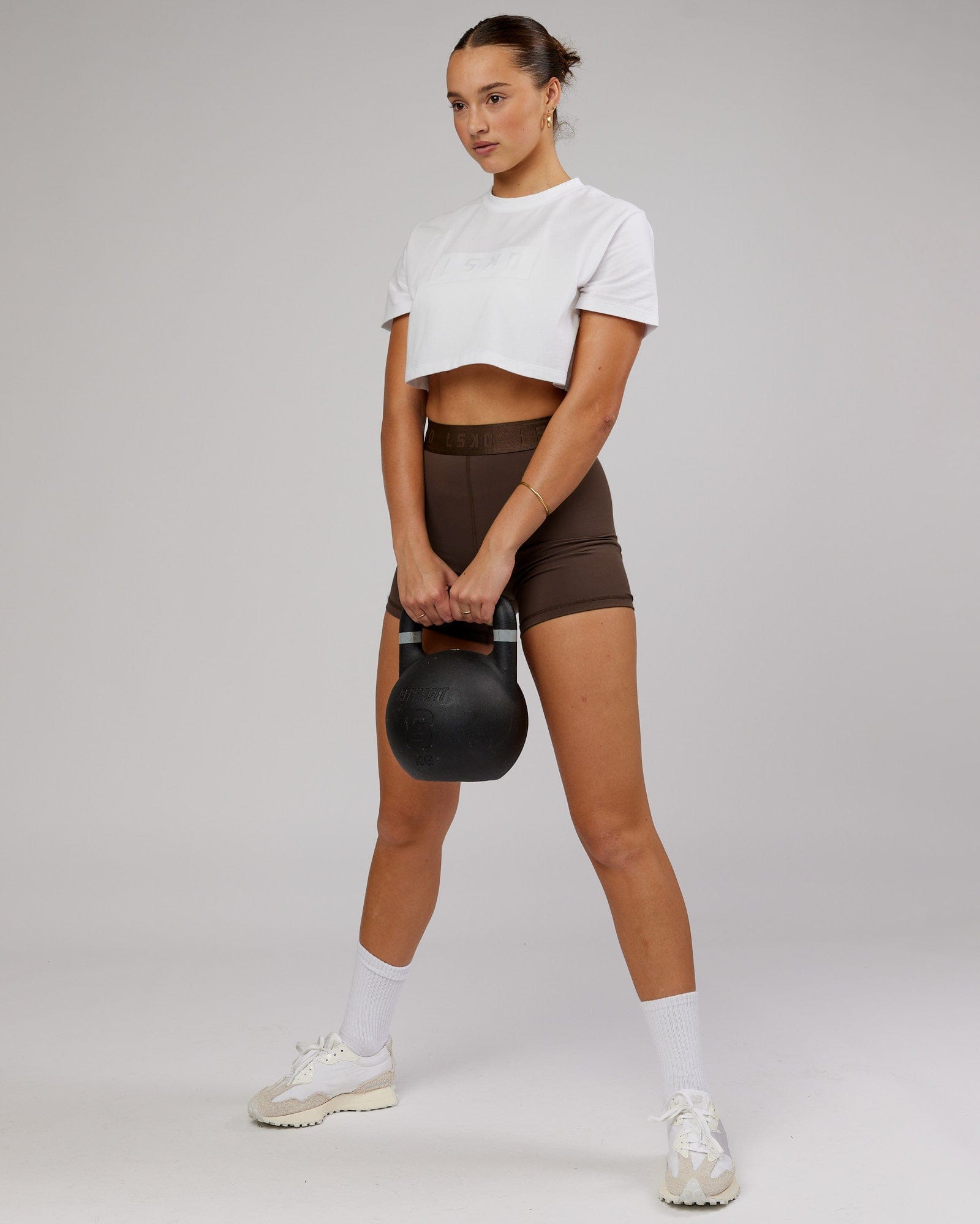 Model wearing Rapid FLXDRY Cropped Tee - White