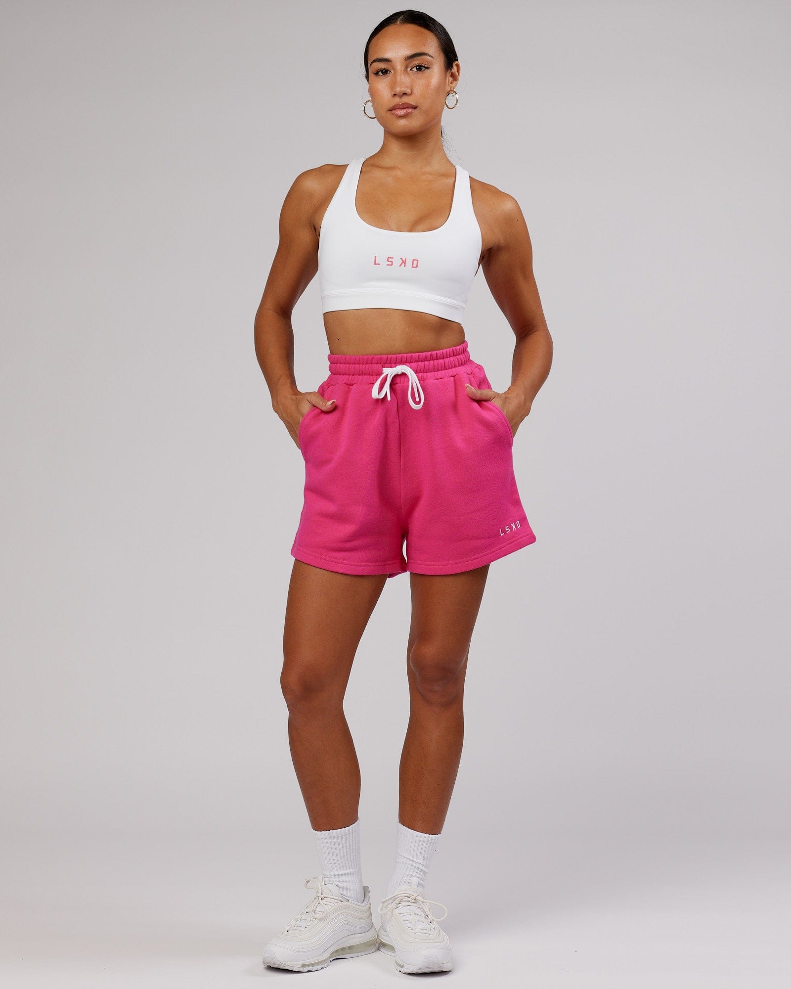 Model wearing Ready Track Short - Magenta