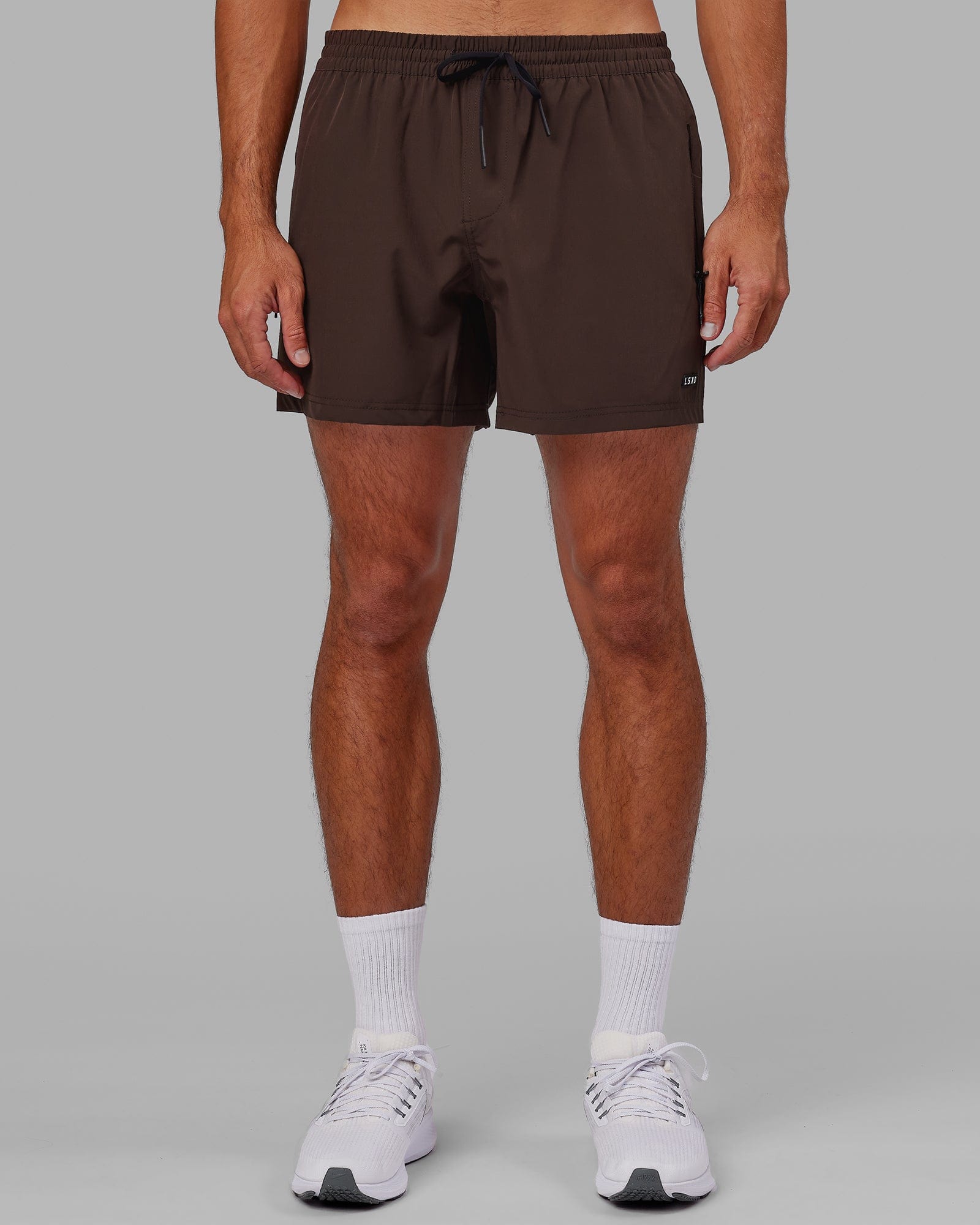 Model wearing Rep 5" Performance Short - Dark Chocolate