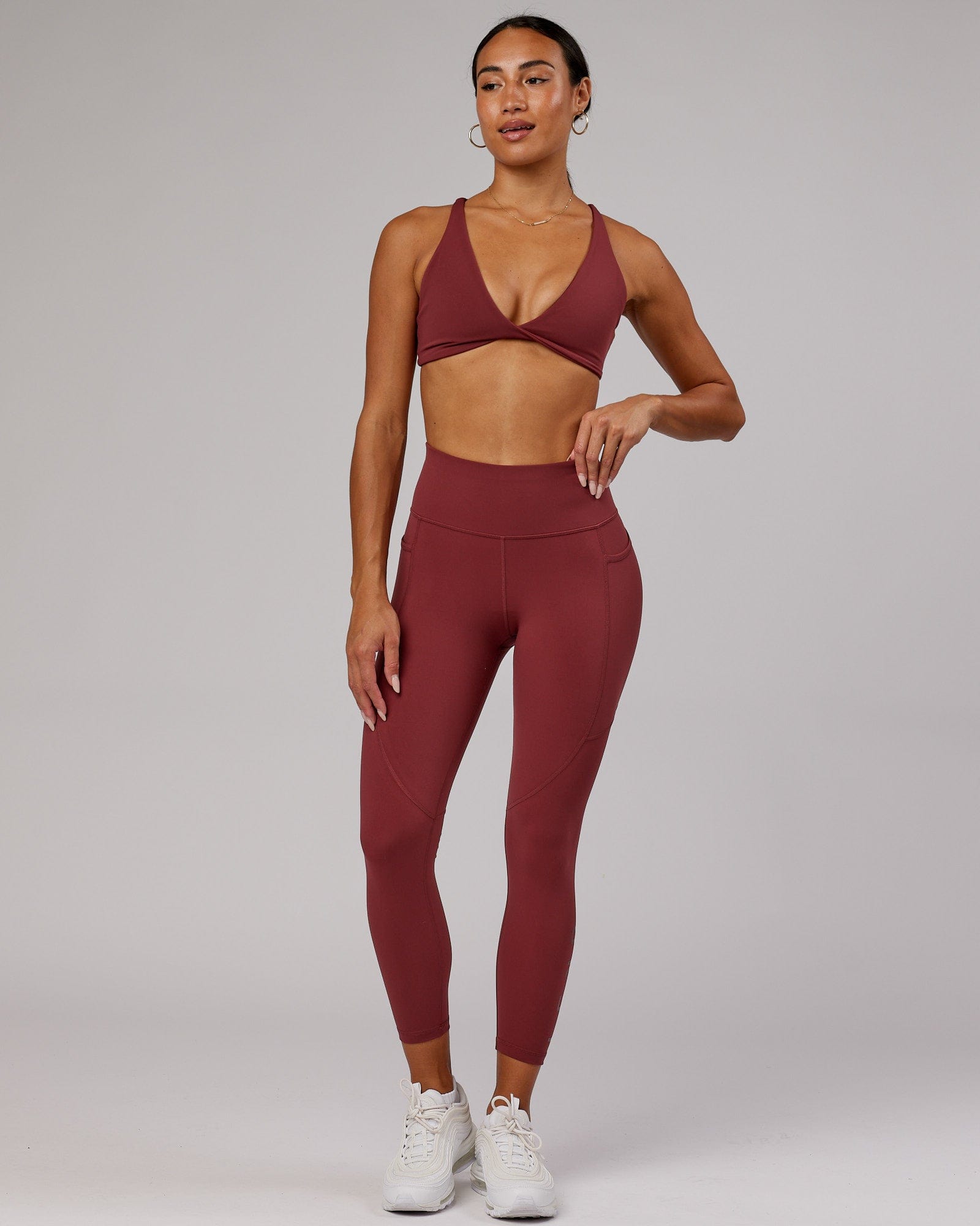 Model wearing Rep 7/8 Length Tight - Apple Berry