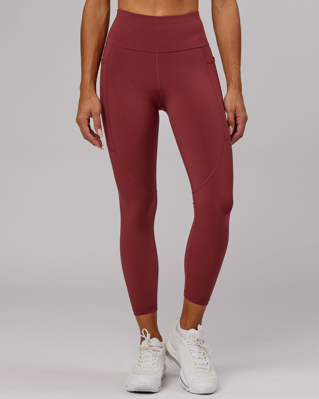 Model wearing Rep 7/8 Length Tight - Apple Berry