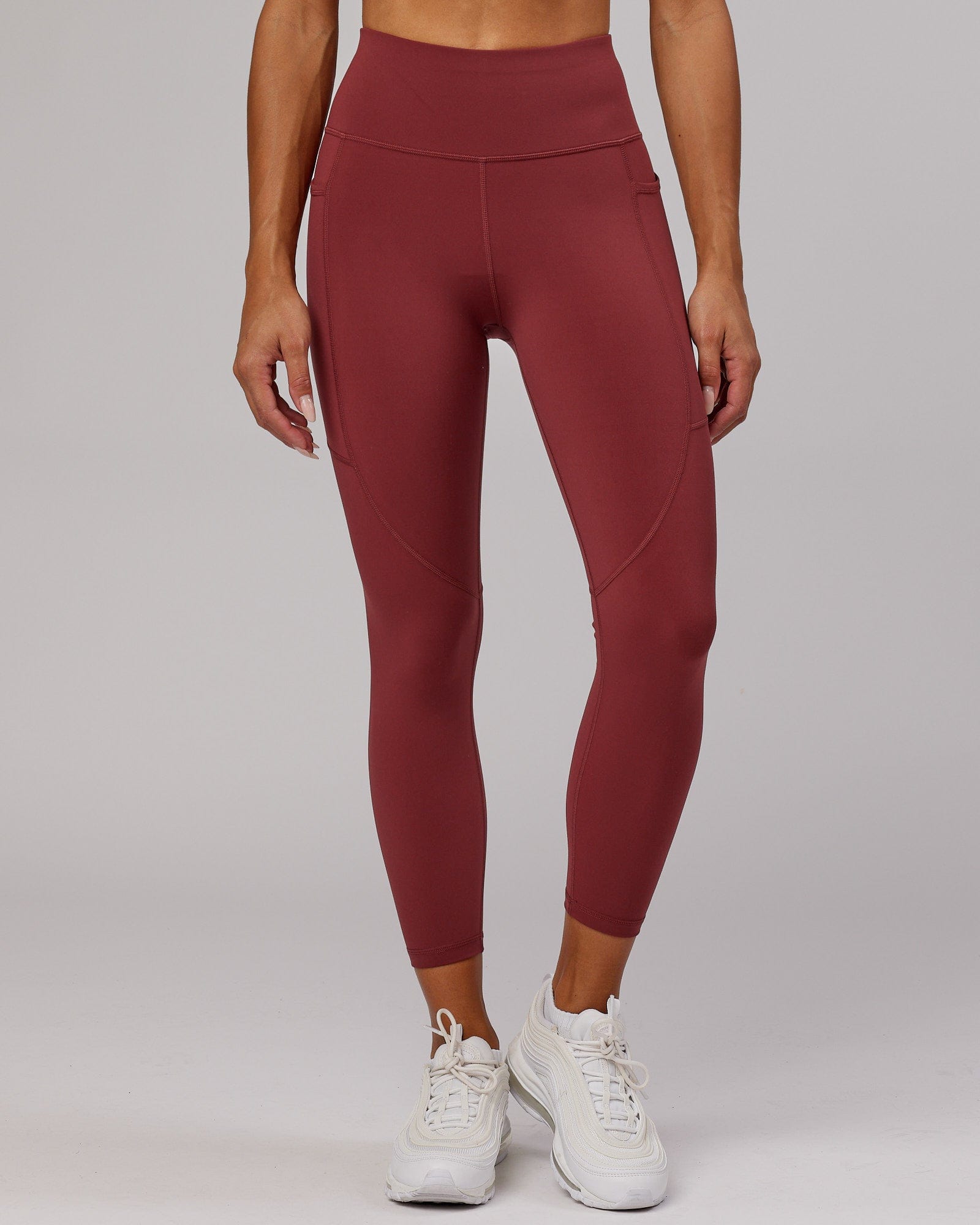 Model wearing Rep 7/8 Length Tight - Apple Berry