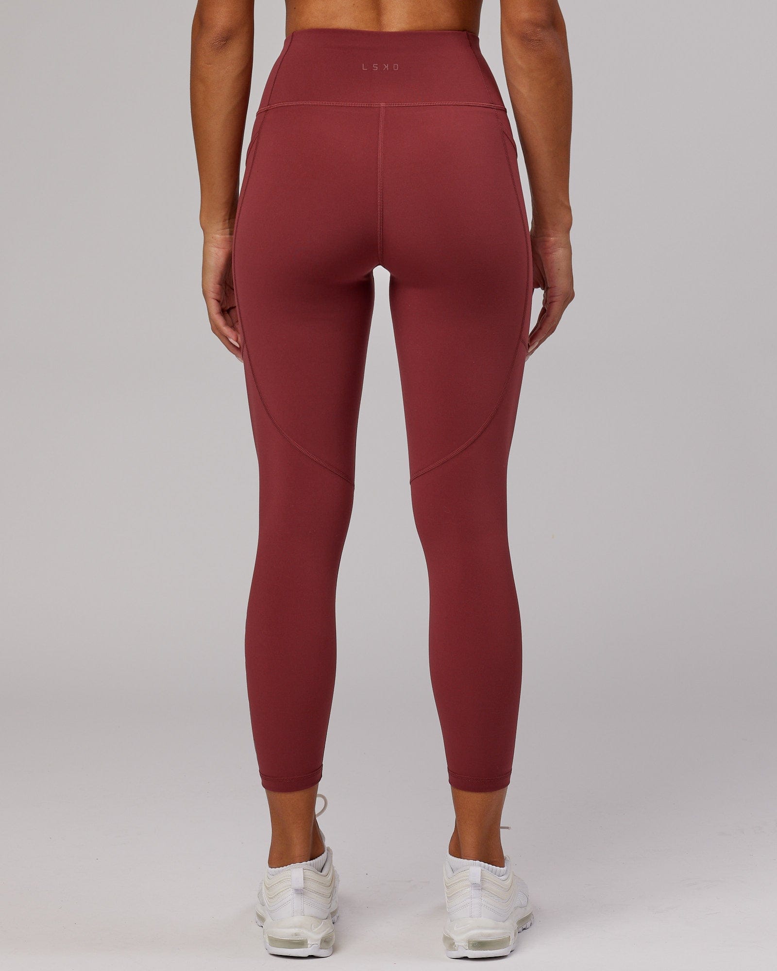 Model wearing Rep 7/8 Length Tight - Apple Berry