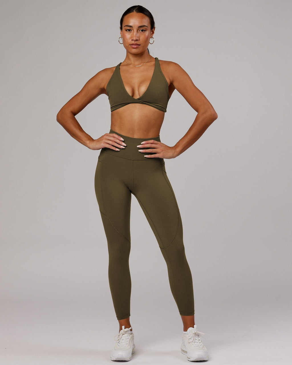 Model wearing Rep 7/8 Length Tight - Army Green