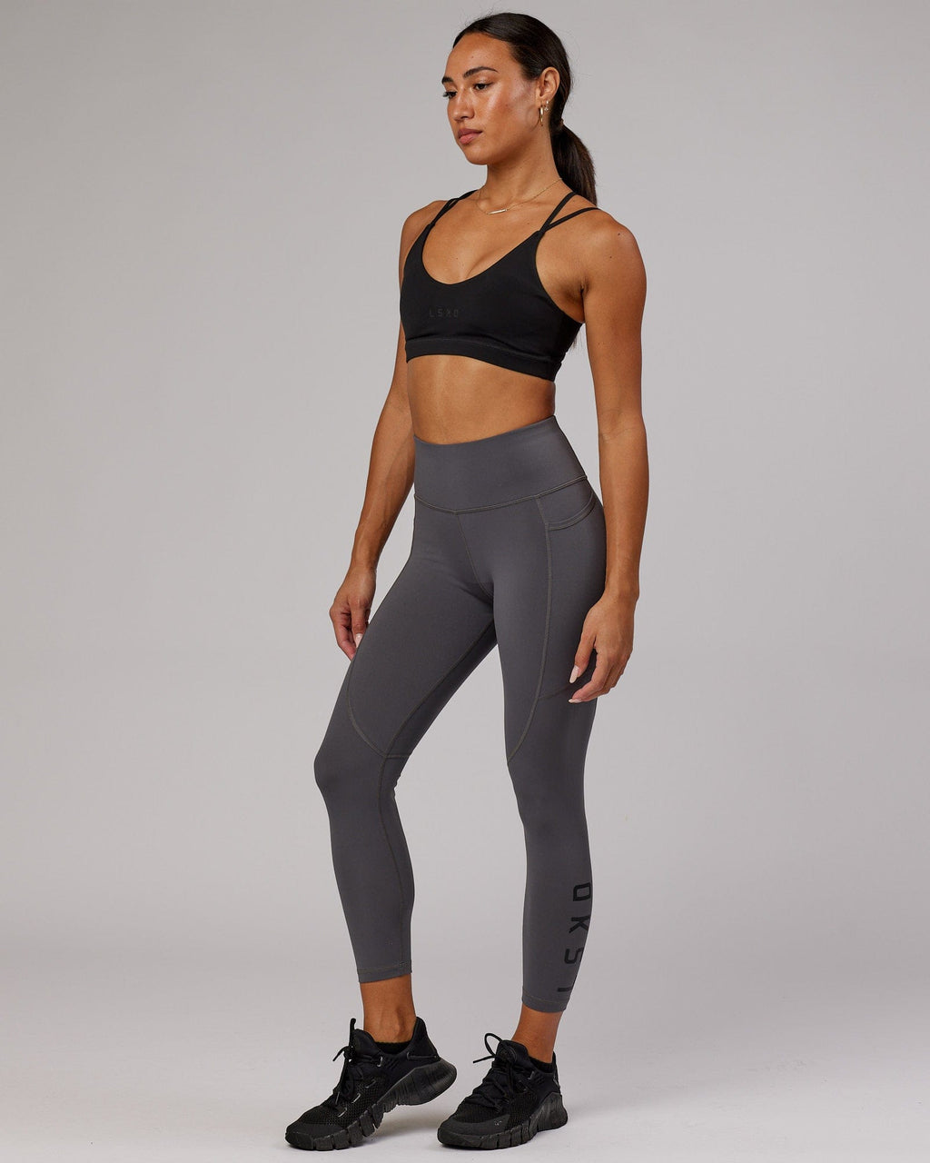 Model wearing Rep 7/8 Length Tight - Asphalt