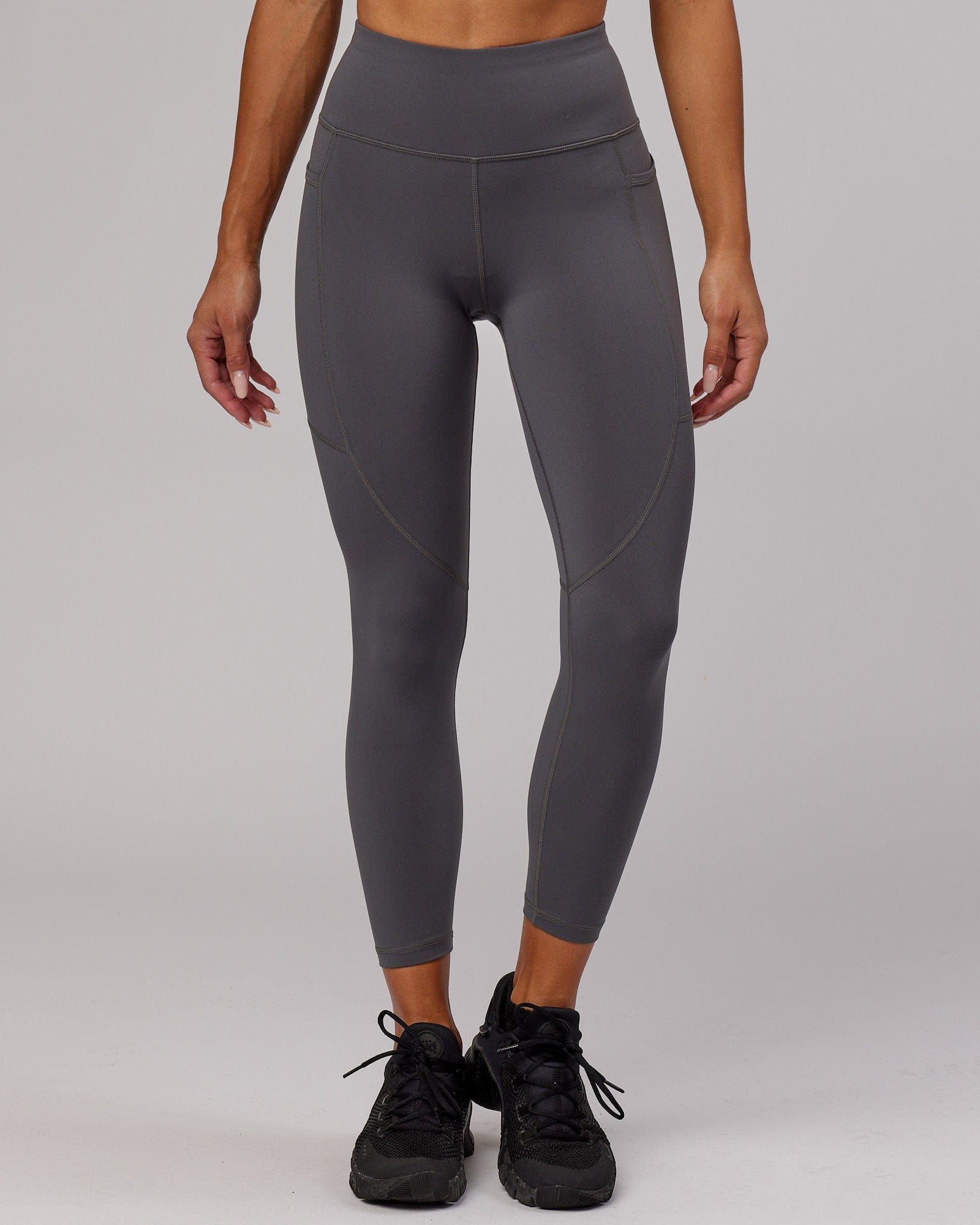 Model wearing Rep 7/8 Length Tight - Asphalt