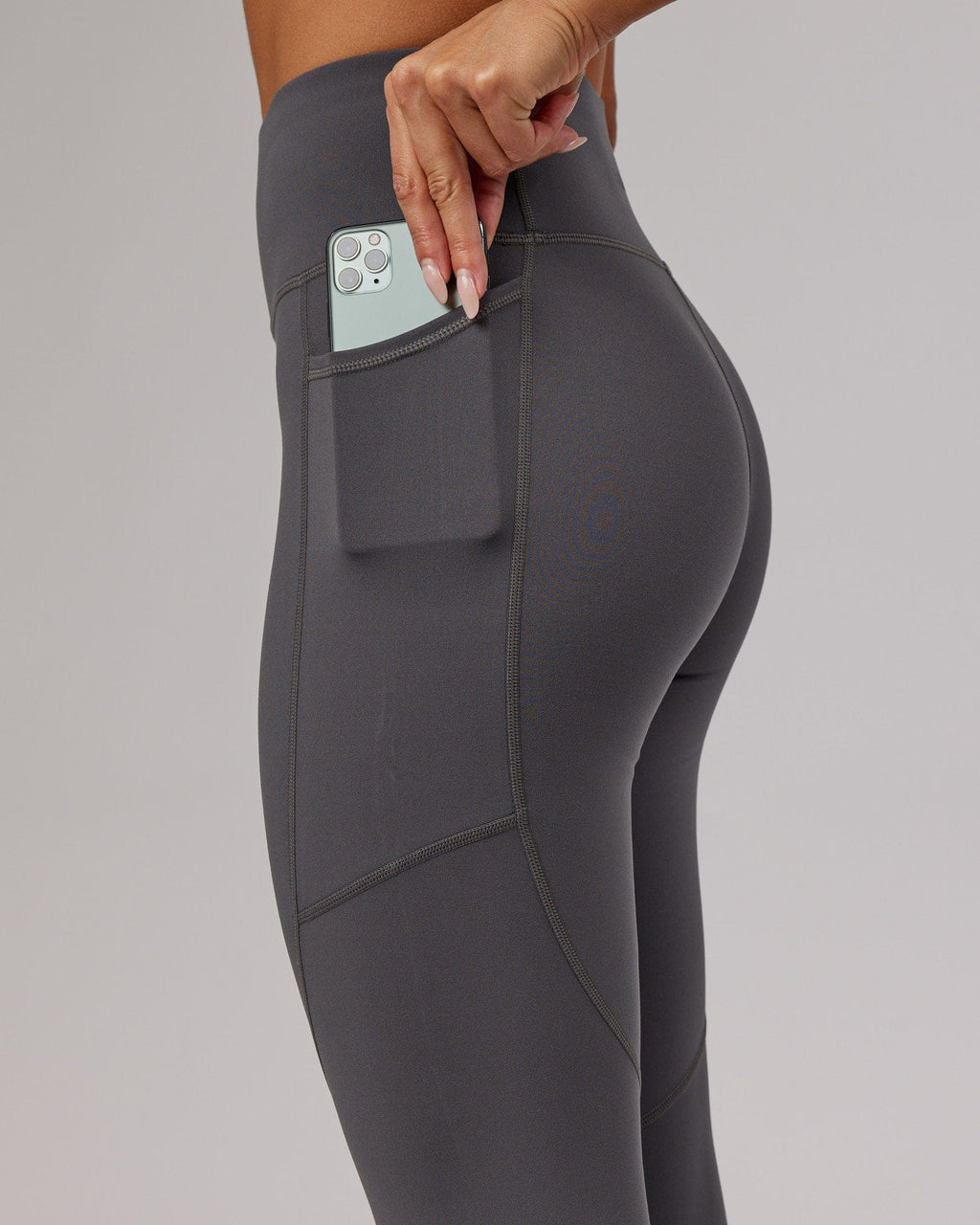 Model wearing Rep 7/8 Length Tight - Asphalt