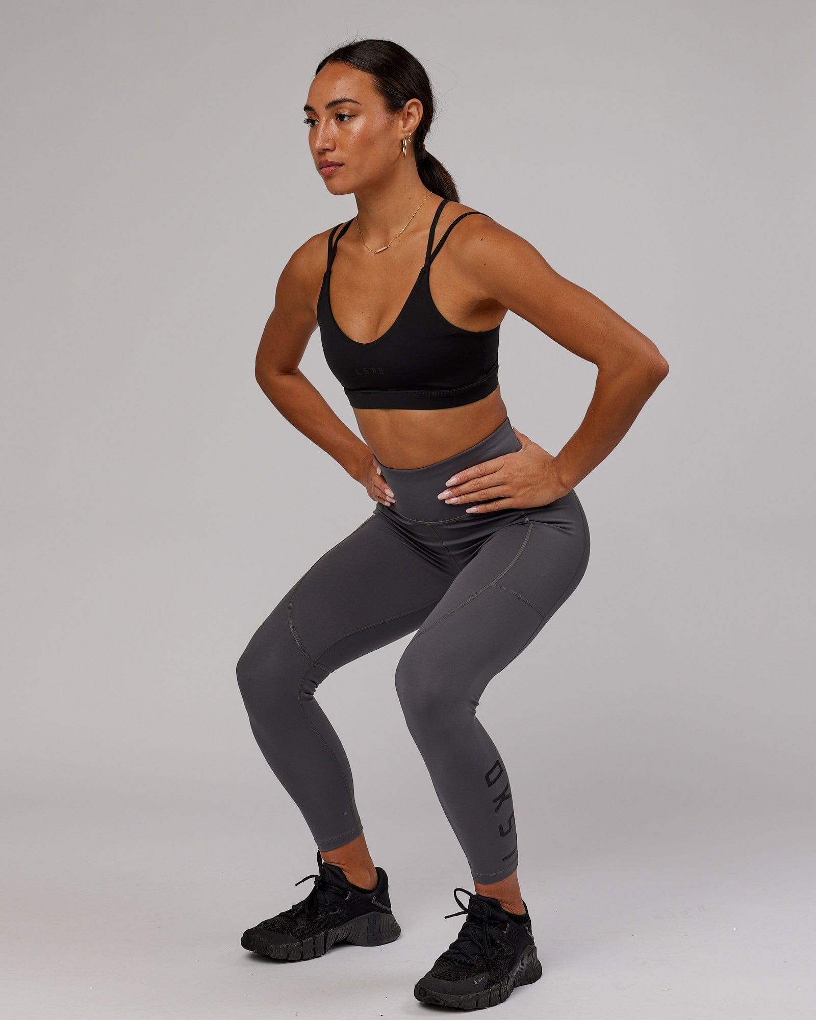 Model wearing Rep 7/8 Length Tight - Asphalt