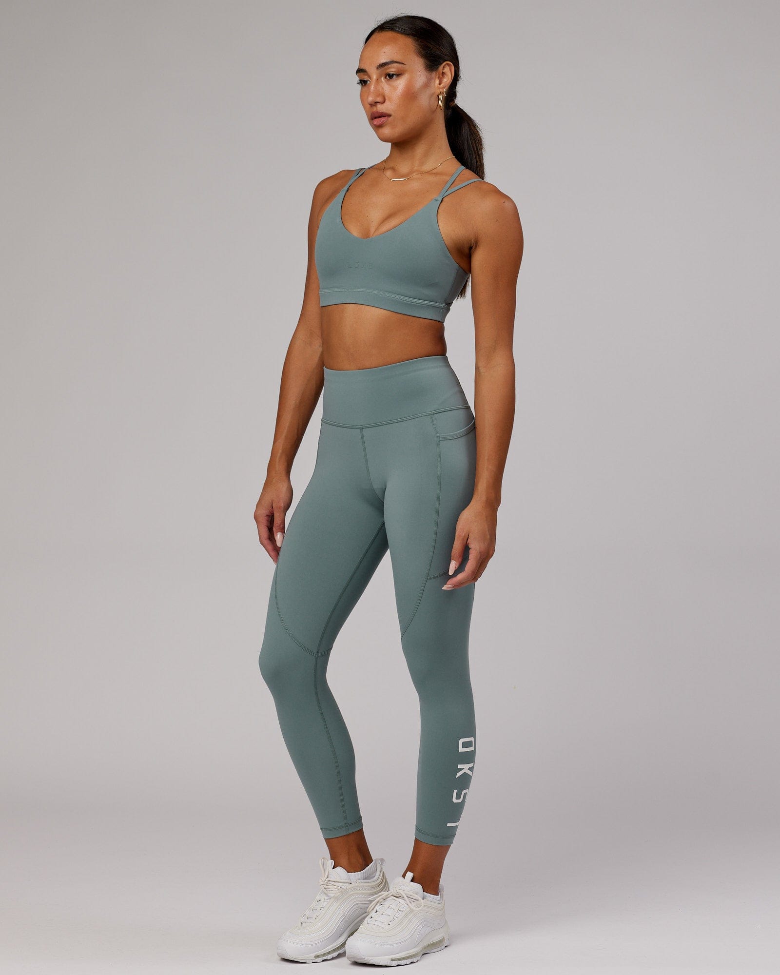 Model wearing Rep 7/8 Length Tight - Eclipse