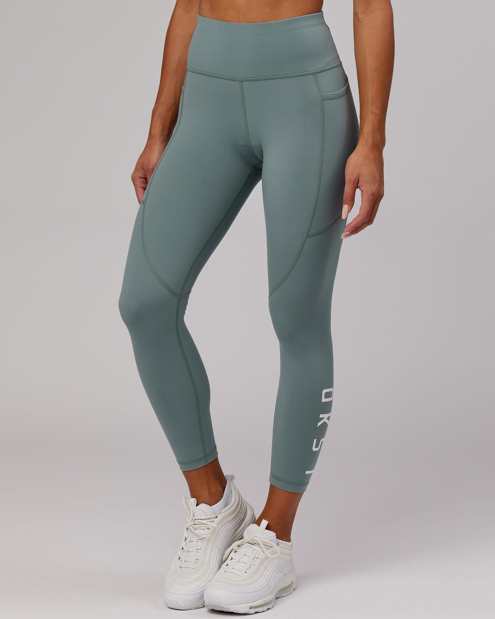 Model wearing Rep 7/8 Length Tight - Eclipse