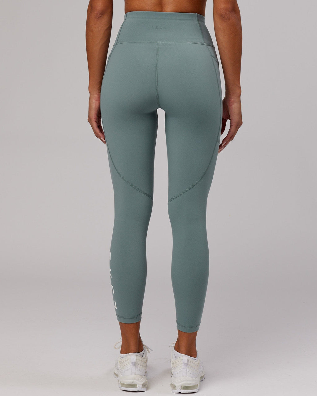 Model wearing Rep 7/8 Length Tight - Eclipse