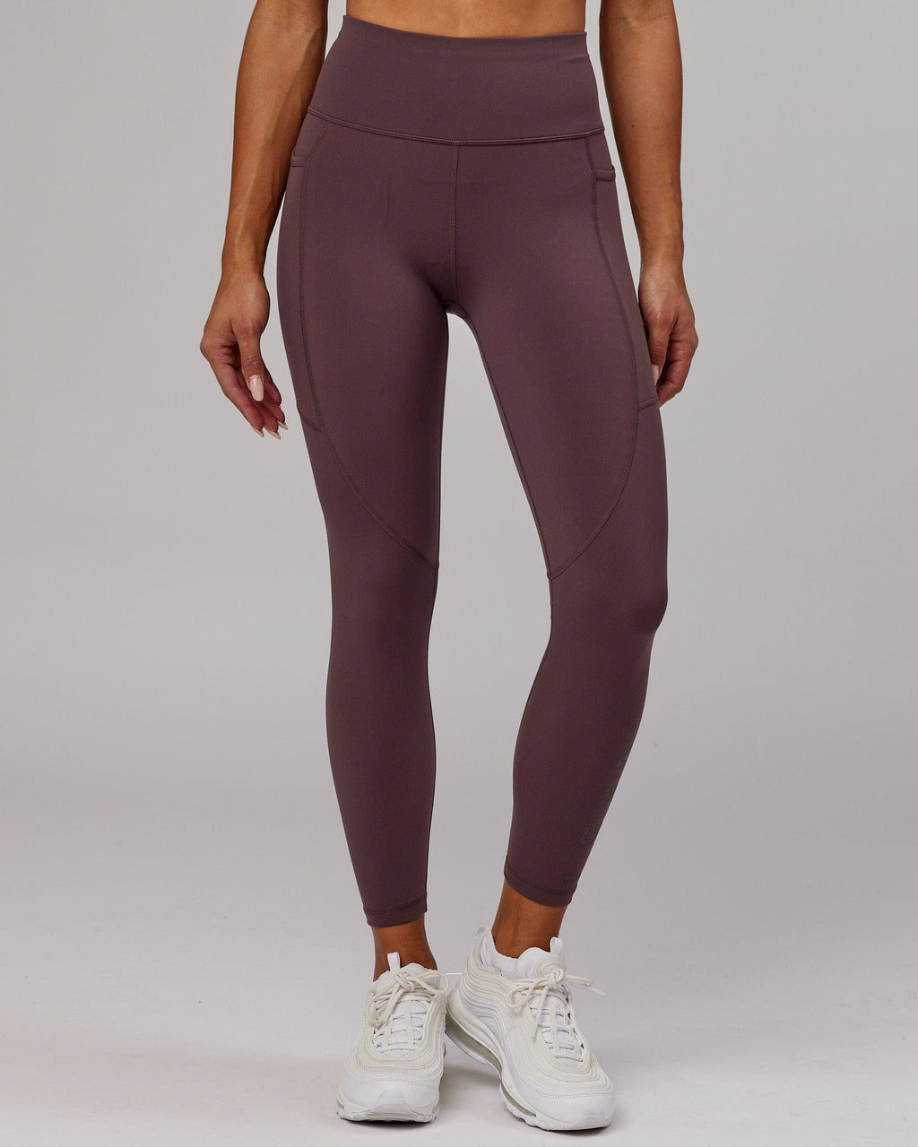 Model wearing Rep 7/8 Length Tight - Plum