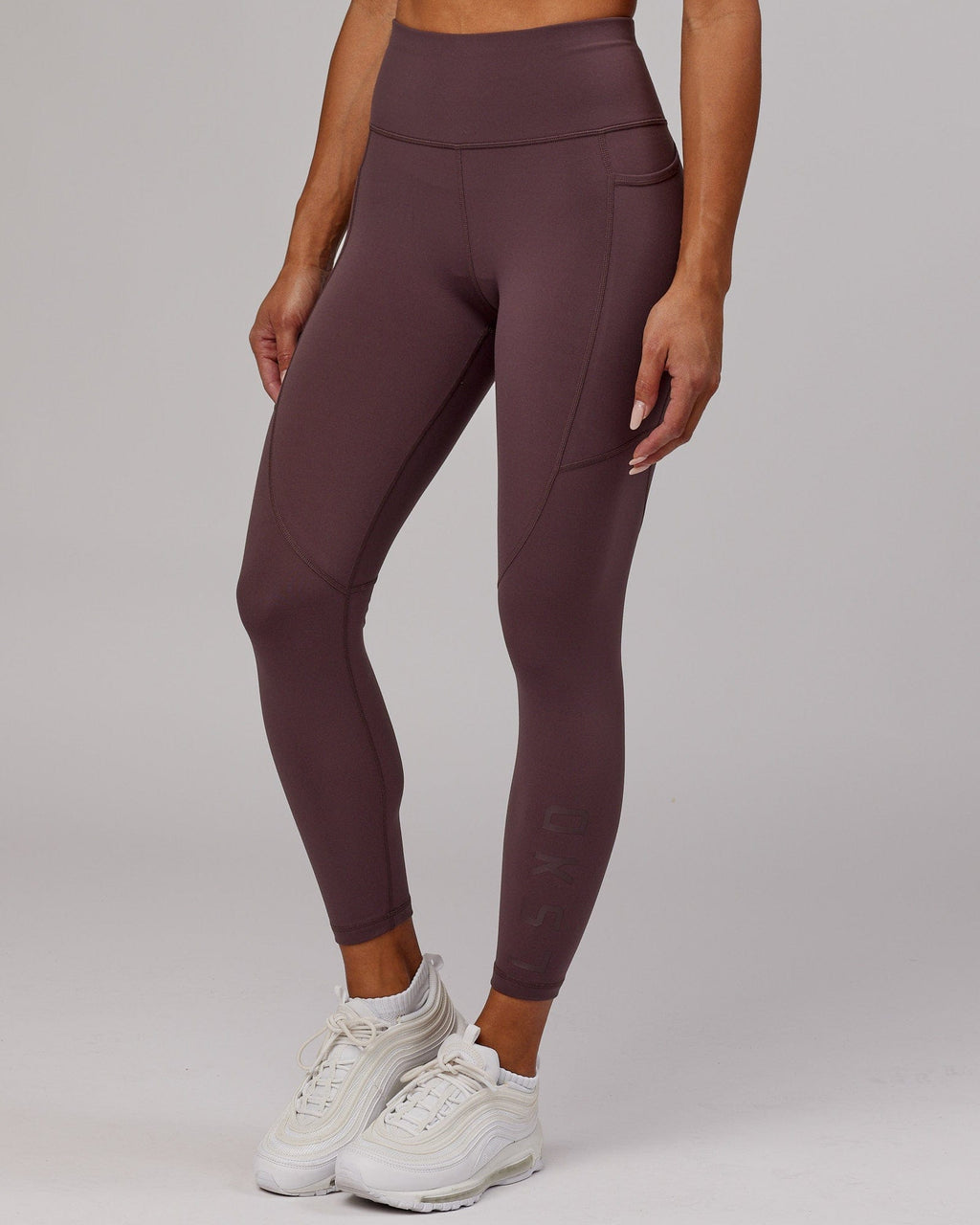 Model wearing Rep 7/8 Length Tight - Plum
