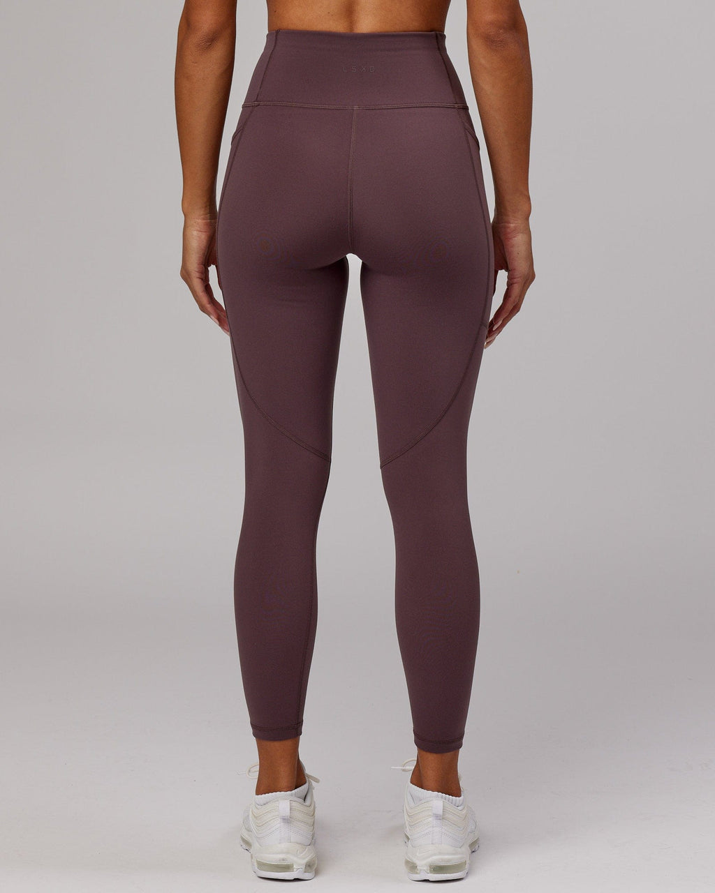 Model wearing Rep 7/8 Length Tight - Plum