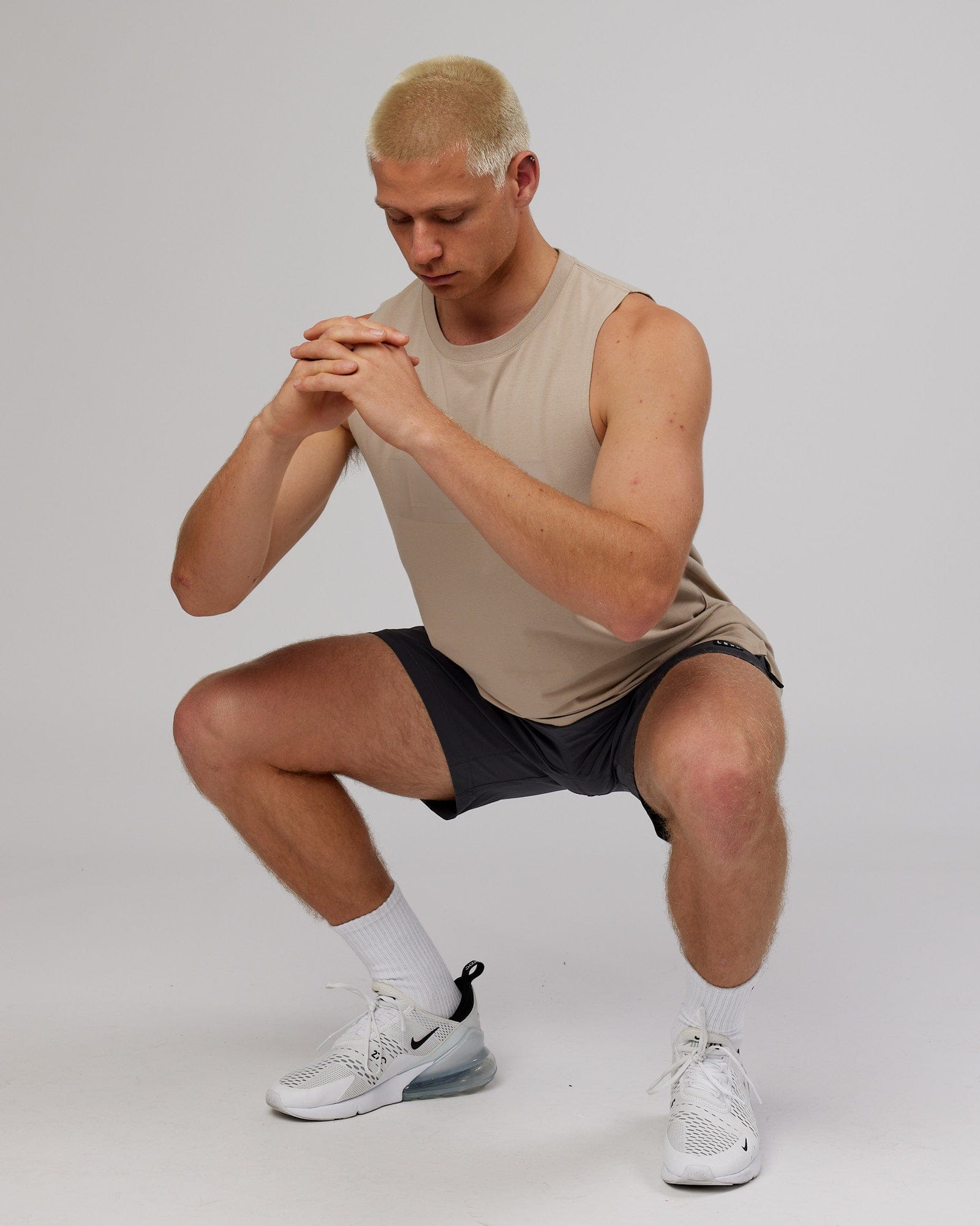 Model wearing Rep 7'' Performance Short - Asphalt