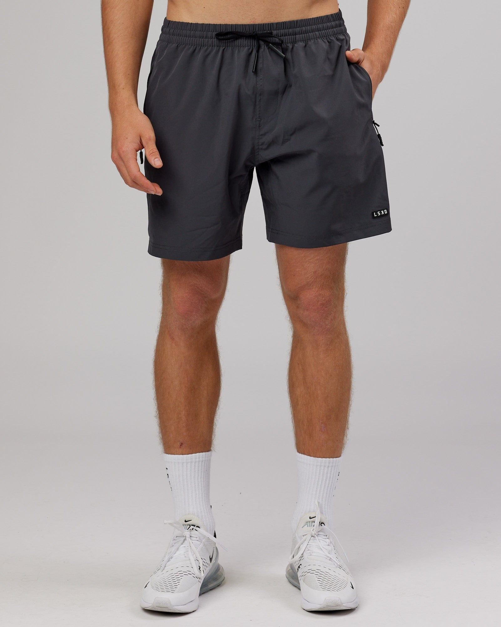 Model wearing Rep 7'' Performance Short - Asphalt