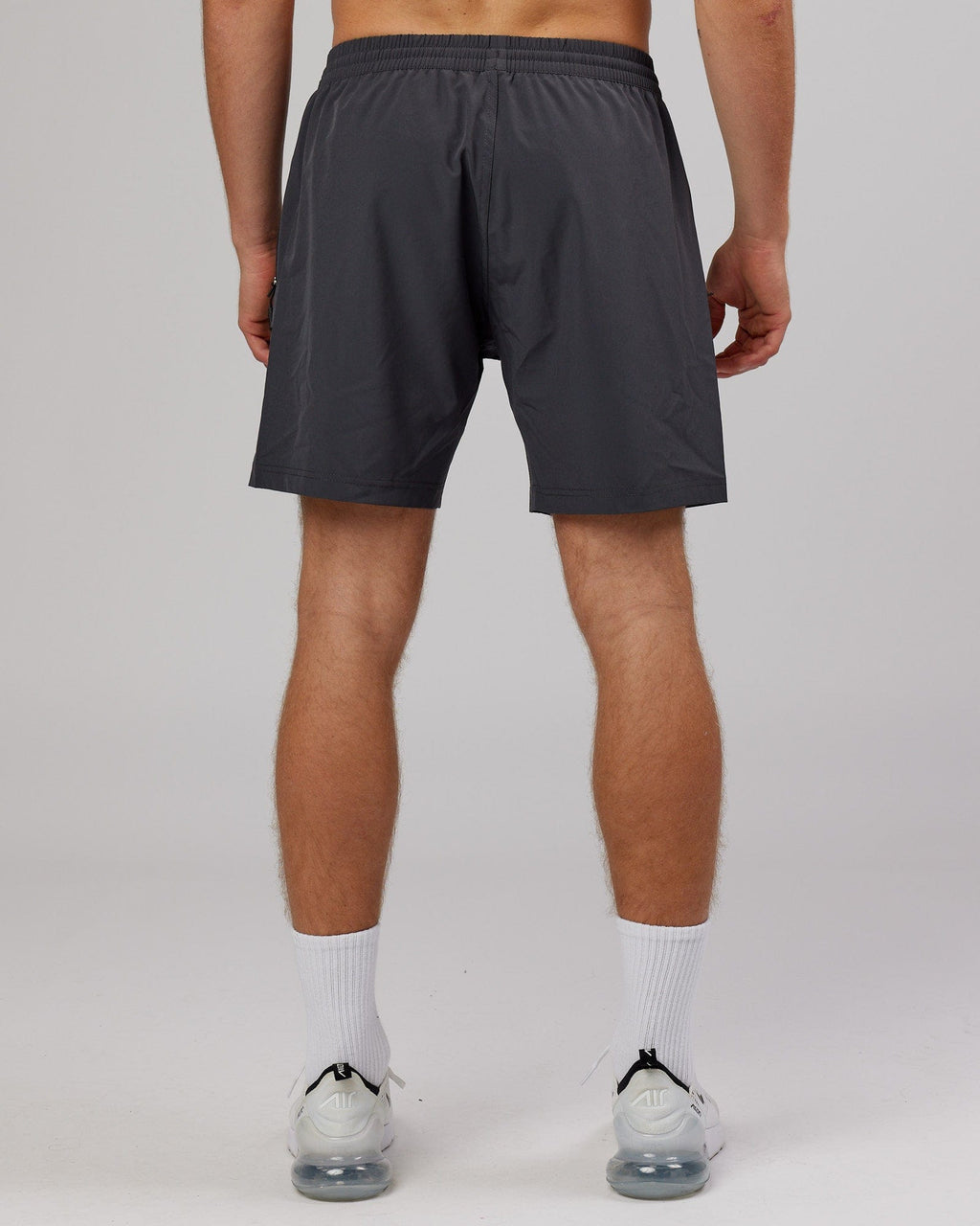 Model wearing Rep 7'' Performance Short - Asphalt