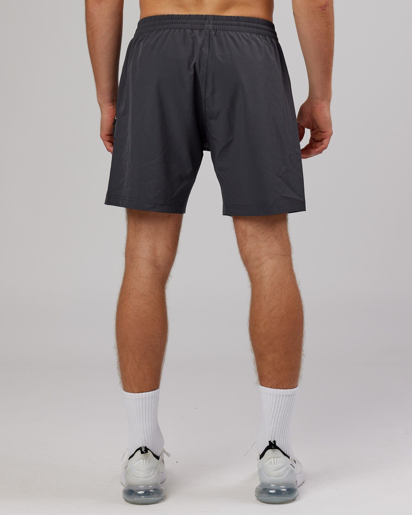 Model wearing Rep 7'' Performance Short - Asphalt