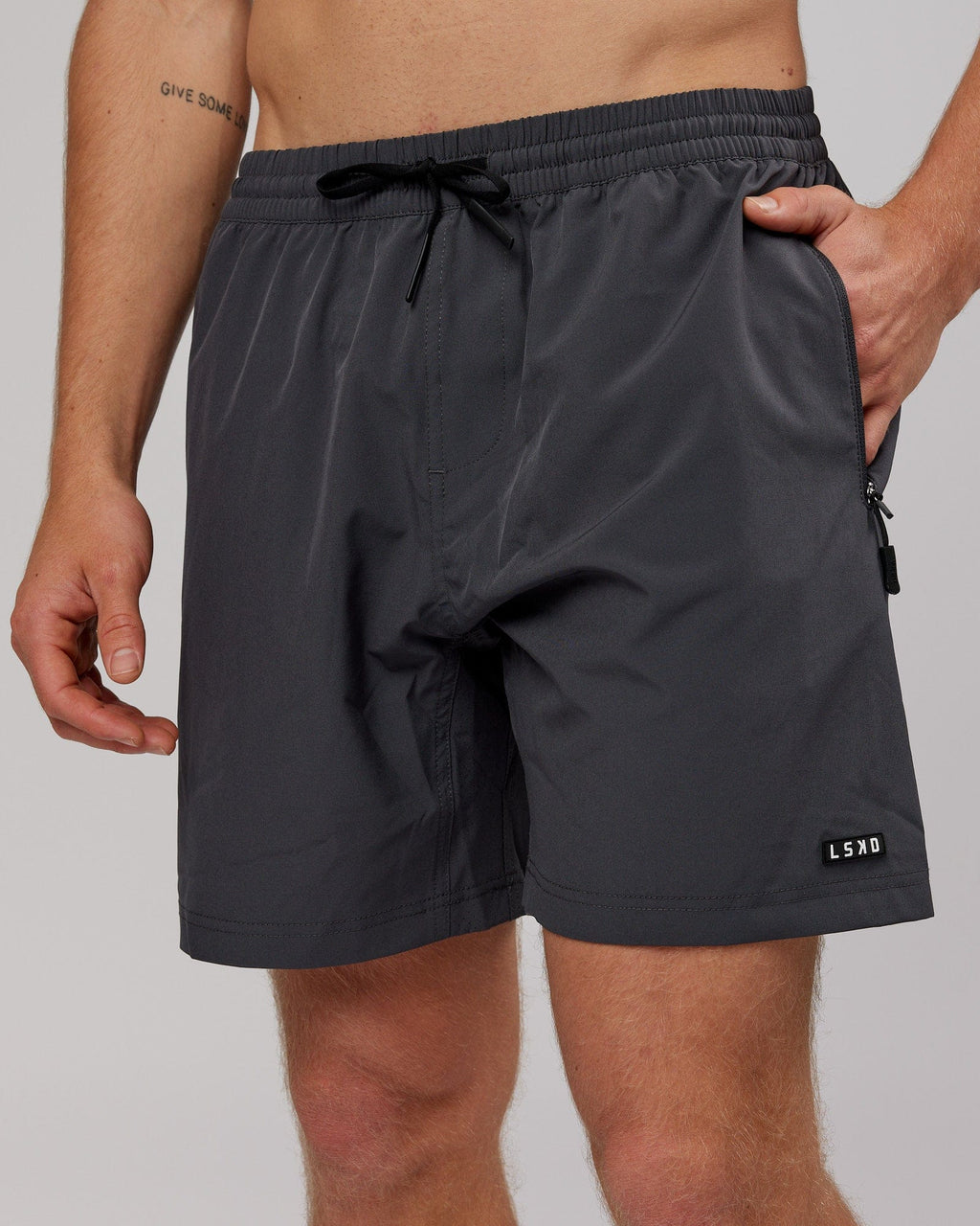 Model wearing Rep 7'' Performance Short - Asphalt